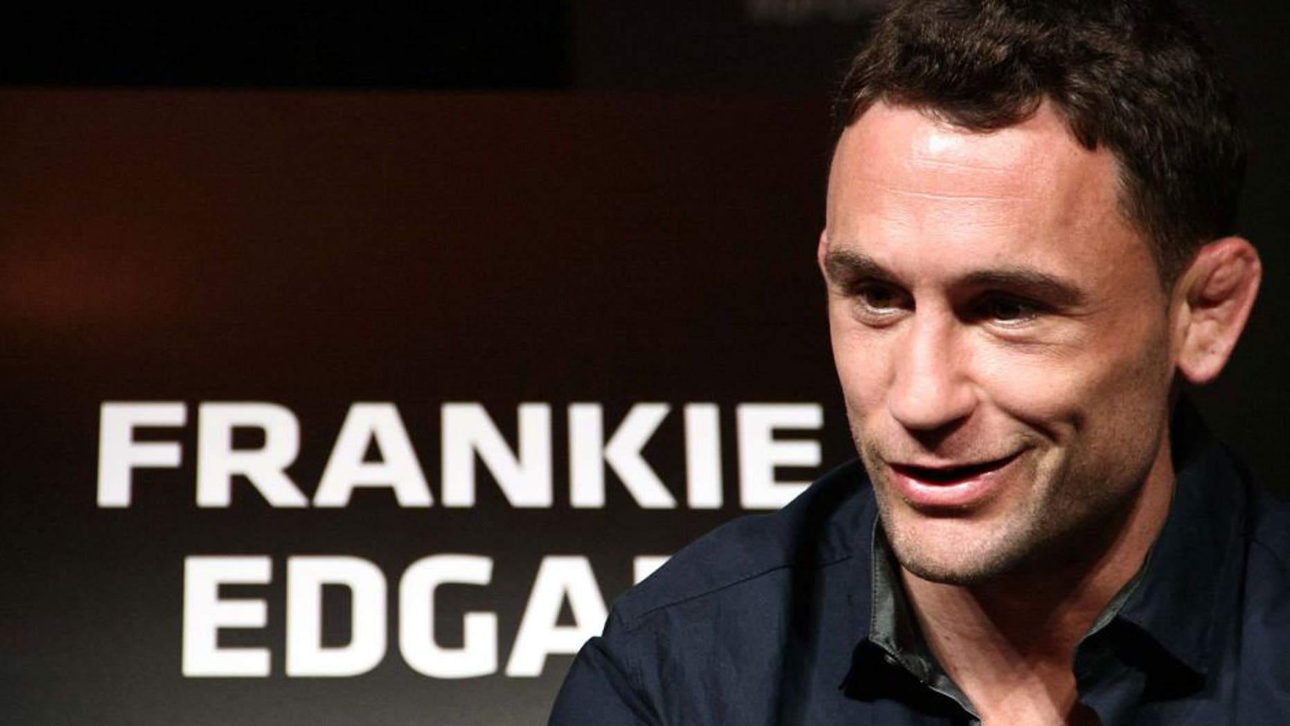 PASAY, PHILIPPINES - 2015/05/14: Frankie Edgar, fighting for the featherweight title, looks on as he is being interviewed by the media at the Solaire Resorts and Casinos in Pasay City. UFC fighters talked to the media two days ahead of their scheduled fight at the Mall of Asia Arena on the 16th of May. (Photo by J Gerard Seguia/Pacific Press/LightRocket via Getty Images)