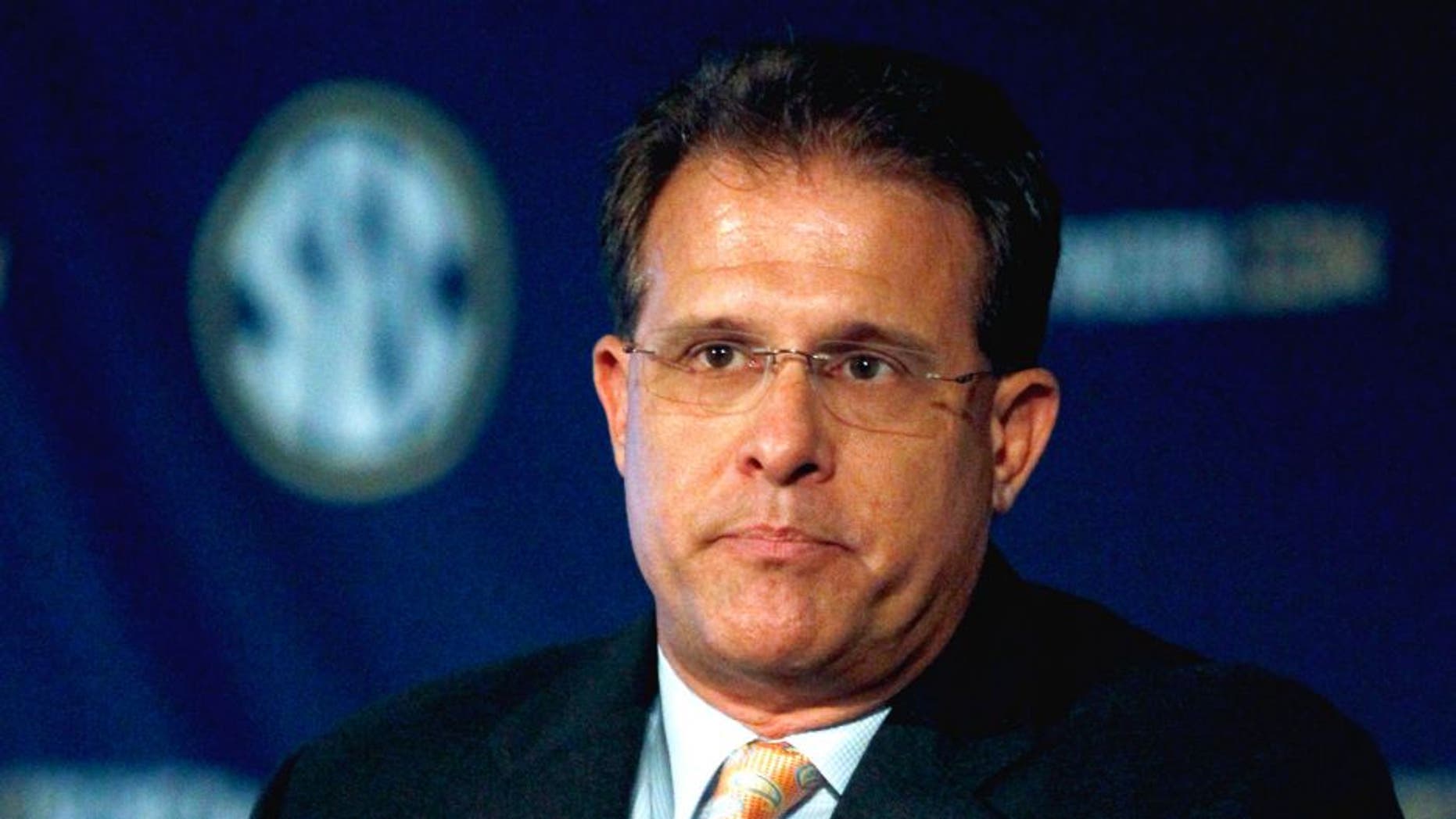 Auburn coach Gus Malzahn speaks during SEC media days on Monday, July 14, 2014, in Hoover, Ala. (AP Photo/Butch Dill)