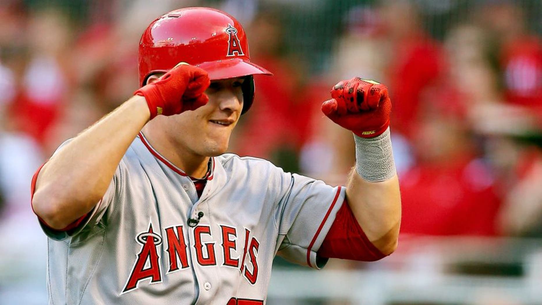 CINCINNATI, OH - JULY 14: American League All-Star Mike Trout #27 of the Los Angeles Angels of Anaheim celebrates after hitting a lead off home run in the first inning against National League All-Star Zack Greinke #21 of the Los Angeles Dodgers during the 86th MLB All-Star Game at the Great American Ball Park on July 14, 2015 in Cincinnati, Ohio. (Photo by Elsa/Getty Images)