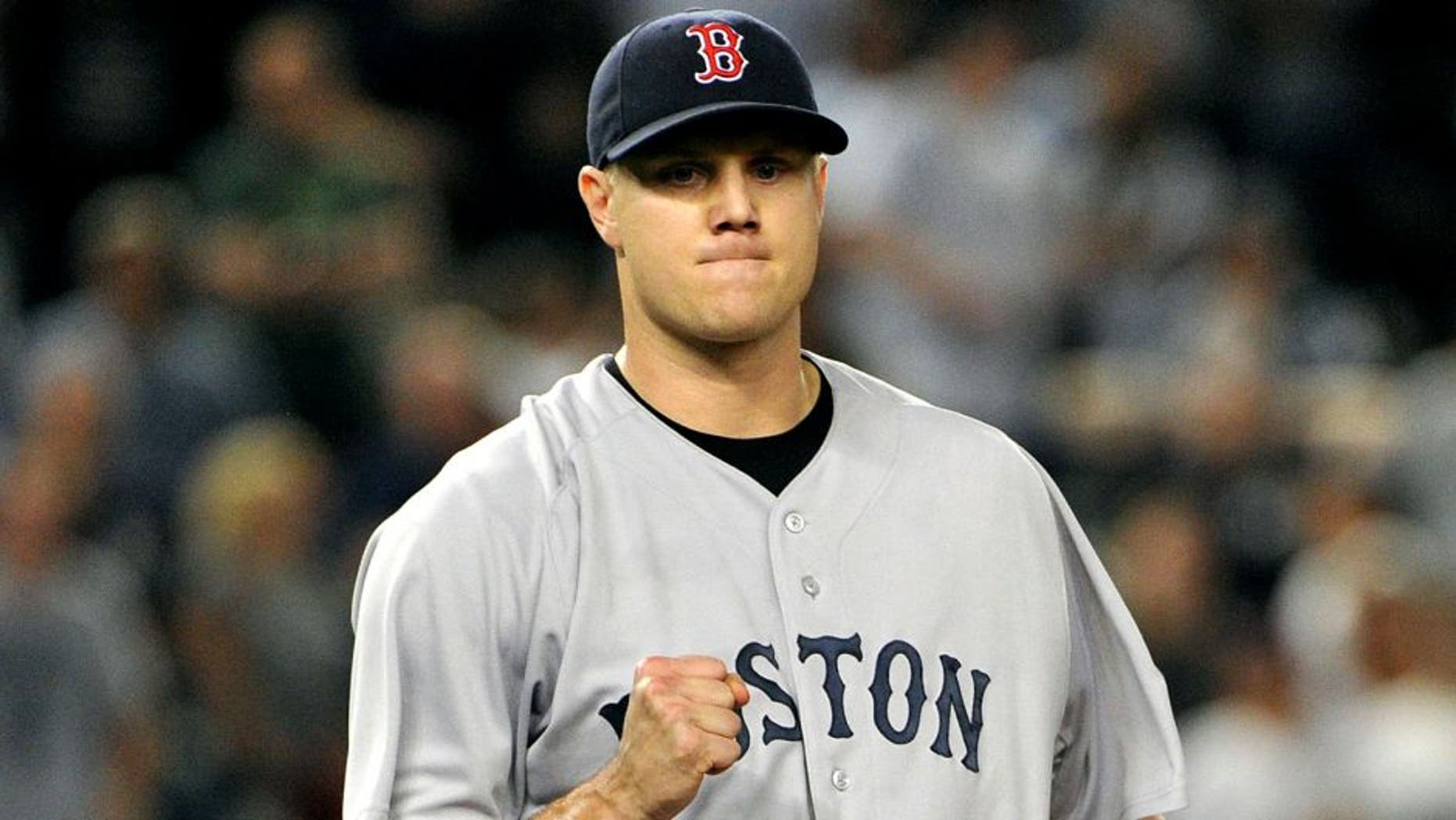 NEW YORK, NY - SEPTEMBER 25: Jonathan Papelbon #58 of the Boston Red Sox reacts after striking out Austin Romine #71 of the New York Yankees (not pictured) with the bases loaded to end the bottom of the ninth inning on September 25, 2011 at Yankee Stadium in the Bronx borough of New York City. (Photo by Christopher Pasatieri/Getty Images)