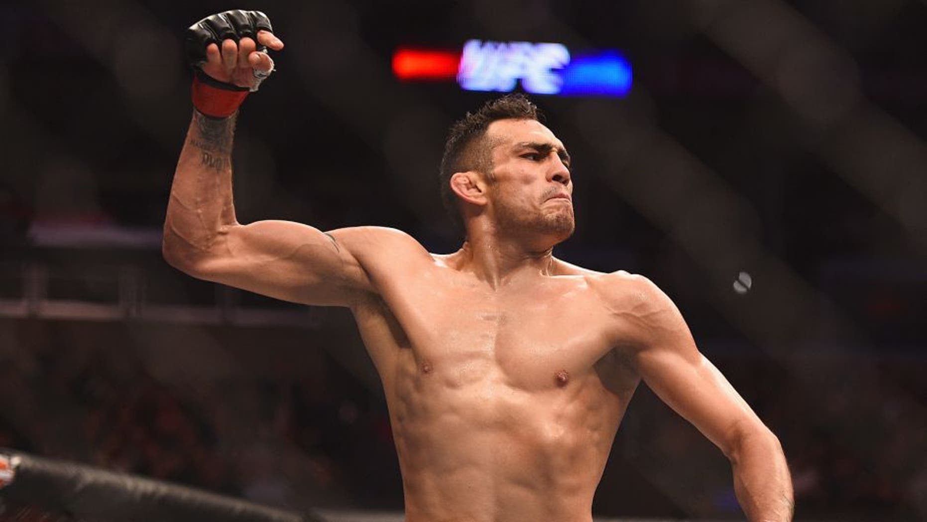 LOS ANGELES, CA - FEBRUARY 28: Tony Ferguson celebrates after defeating Gleison Tibau in their lightweight bout during the UFC 184 event at Staples Center on February 28, 2015 in Los Angeles, California. (Photo by Jeff Bottari/Zuffa LLC/Zuffa LLC via Getty Images)