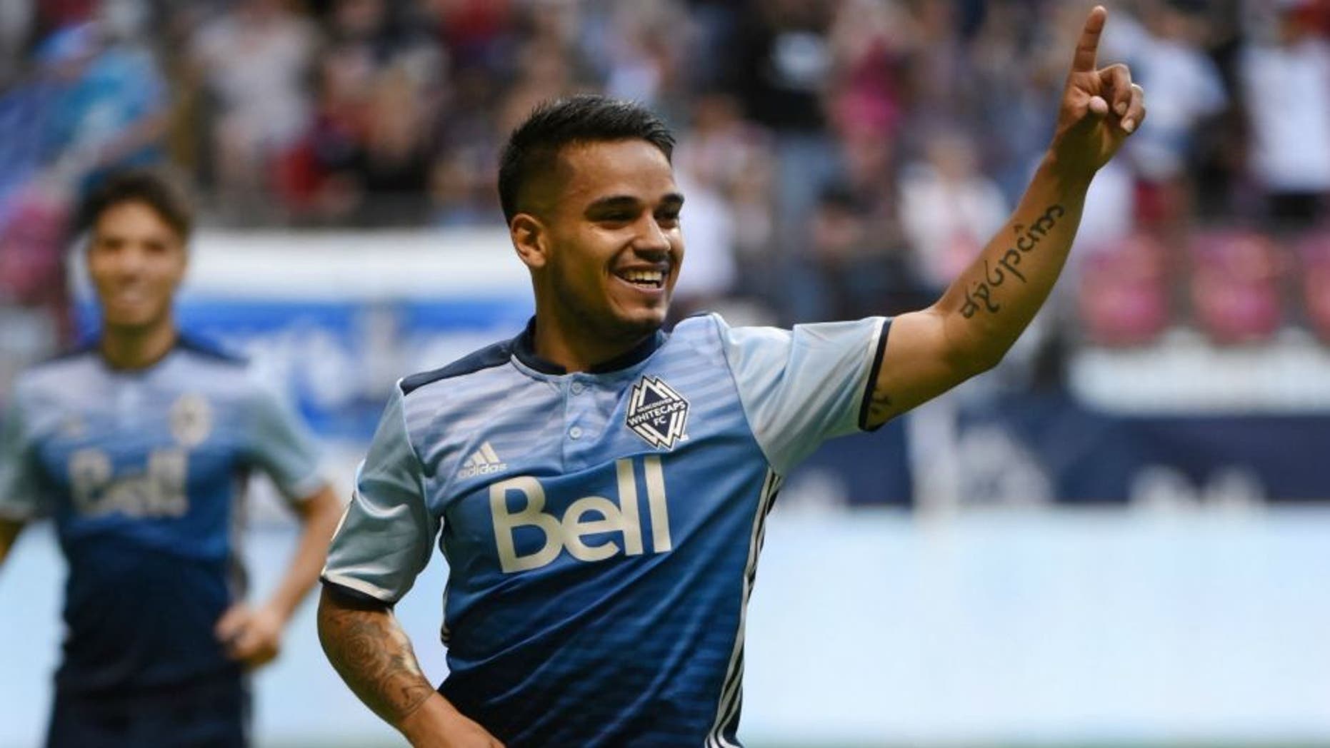Jul 13, 2016; Vancouver, British Columbia, CAN; Vancouver Whitecaps midfielder Cristian Techera (13) celebrates a goal against Real Salt Lake goalkeeper Jeff Attinella (not pictured) during the first half at BC Place. Mandatory Credit: Anne-Marie Sorvin-USA TODAY Sports