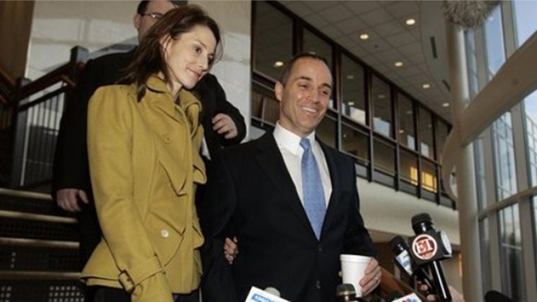 Feb. 10: Andrew Young, left, and his wife Cheri Young leave the Orange County courthouse in Hillsborough, N.C., after surrendering videotapes purportedly showing two-time Democratic presidential candidate John Edwards and his former mistress in a sexual encounter.