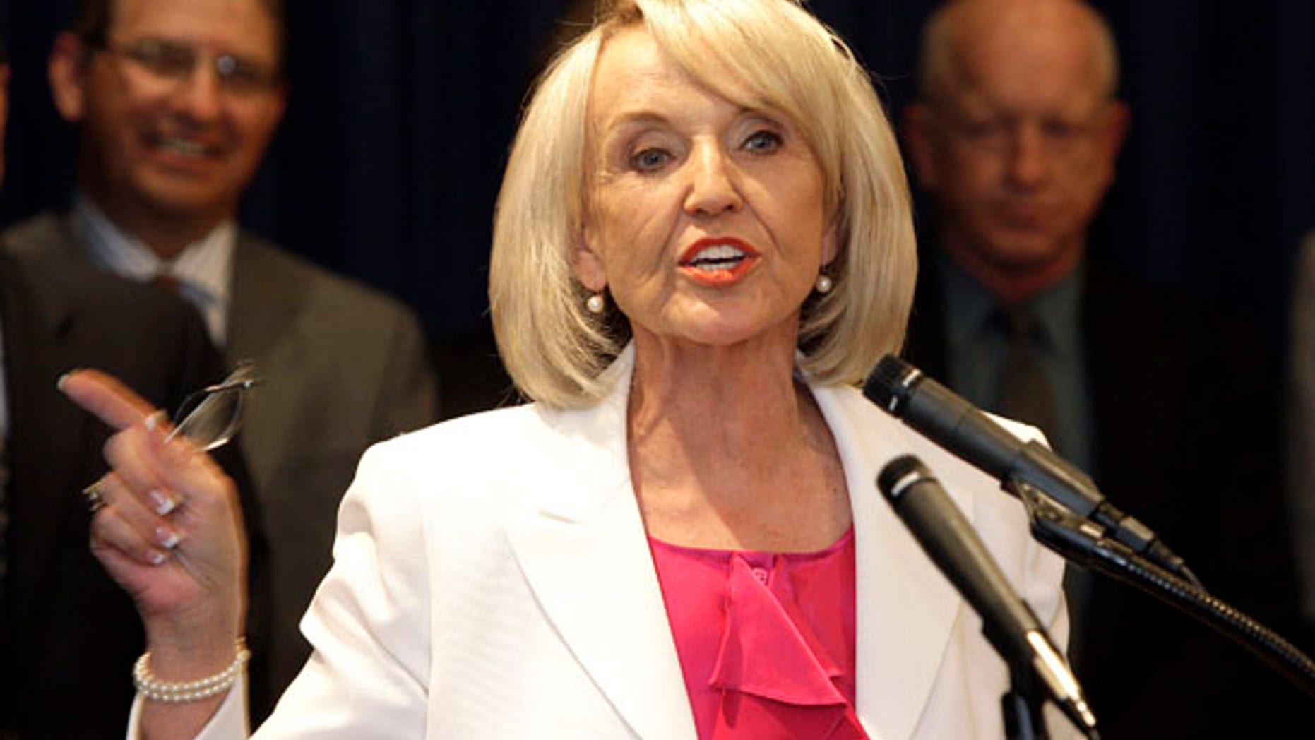 Arizona Gov. Jan Brewer, seen in this 2010 file photo, has vetoed a bill that would have allowed guns on public college campuses.