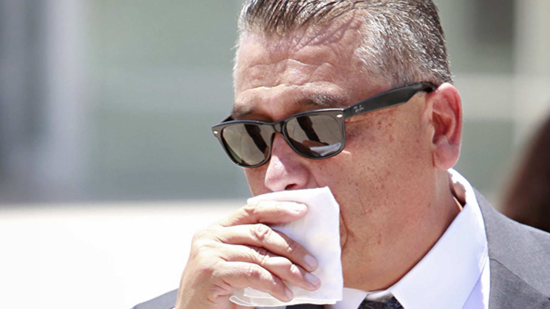July 15: Phoenix police officer David Salgado leaves the federal courthouse in Phoenix.