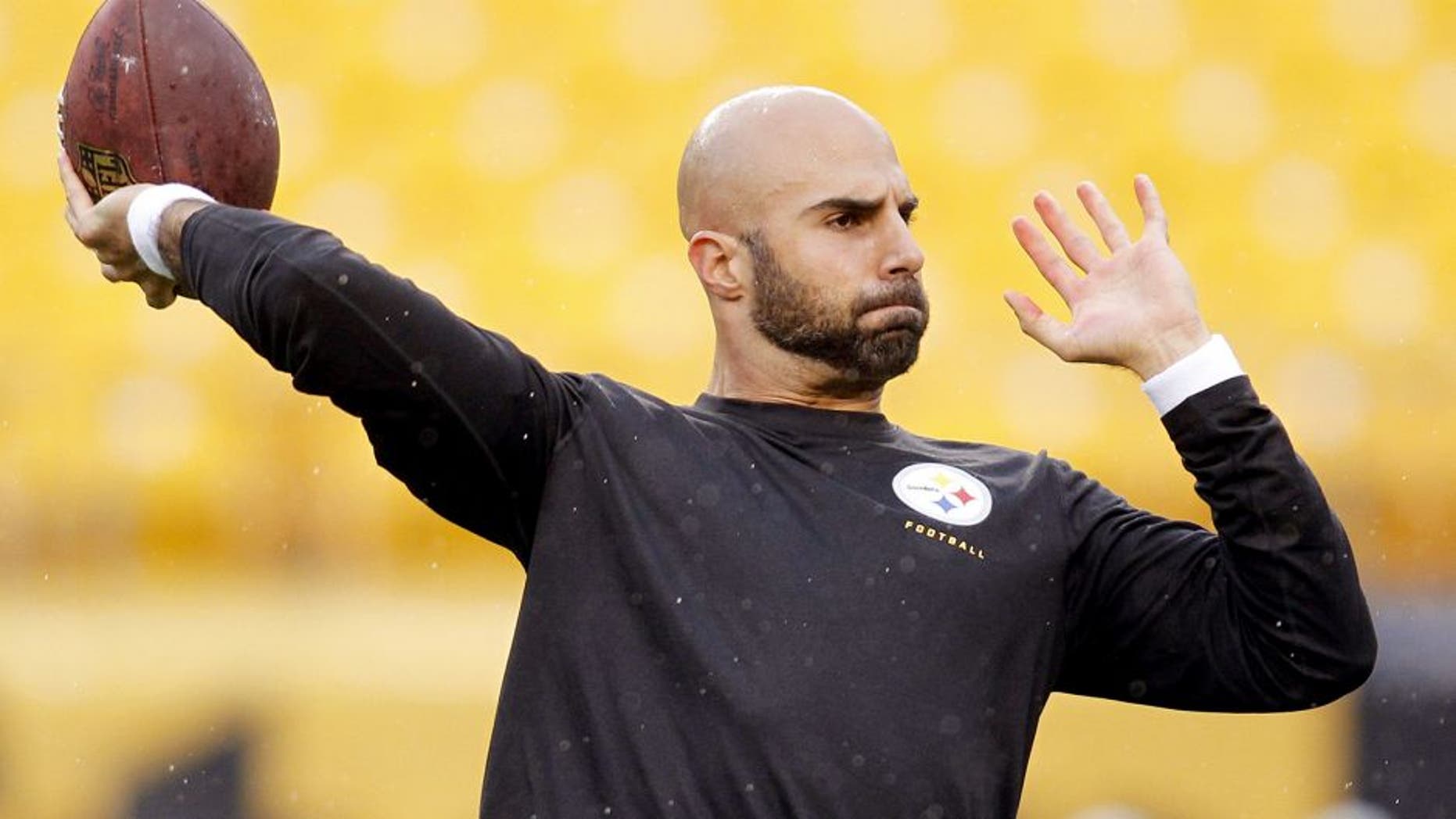 Nov 17, 2013; Pittsburgh, PA, USA; Pittsburgh Steelers quarterback Bruce Gradkowski (5) warms-up on the field before playing the Detroit Lions at Heinz Field. Mandatory Credit: Charles LeClaire-USA TODAY Sports
