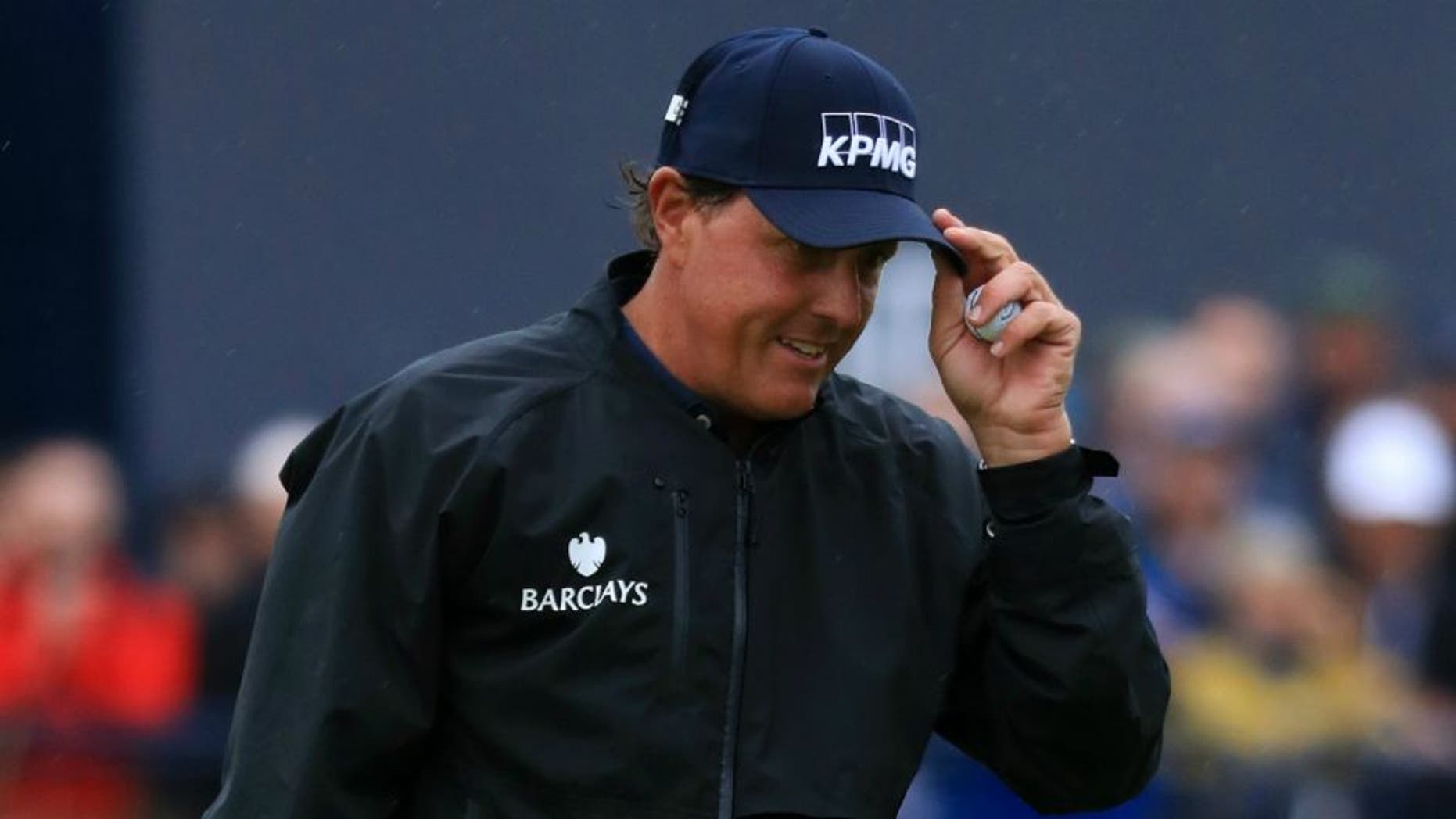 TROON, SCOTLAND - JULY 15: Phil Mickelson of the United States acknowledges the crowd after putting on the 18th green during the second round on day two of the 145th Open Championship at Royal Troon on July 15, 2016 in Troon, Scotland. (Photo by Matthew Lewis/Getty Images)