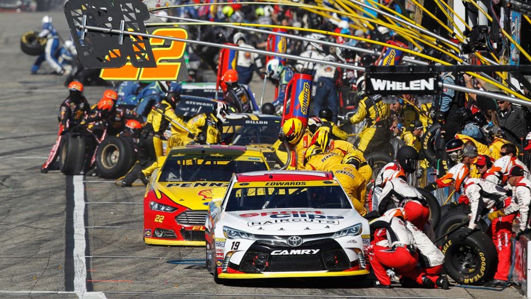 Carl Edwards, driver of the #19 Sport Clips Toyota, pits during the NASCAR Sprint Cup Series SYLVANIA 300 at New Hampshire Motor Speedway on September 27, 2015 in Loudon, New Hampshire.