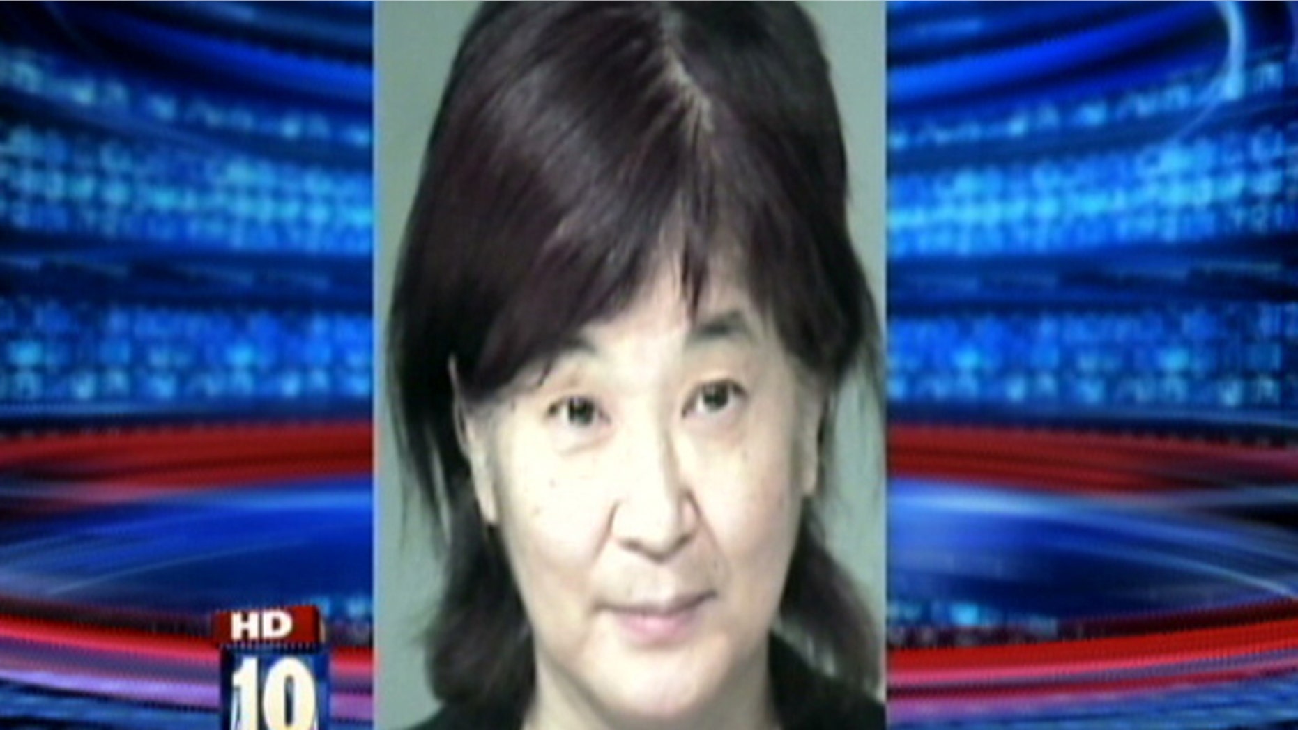 Mugshot of 61-year-old Yukari Mihamae.