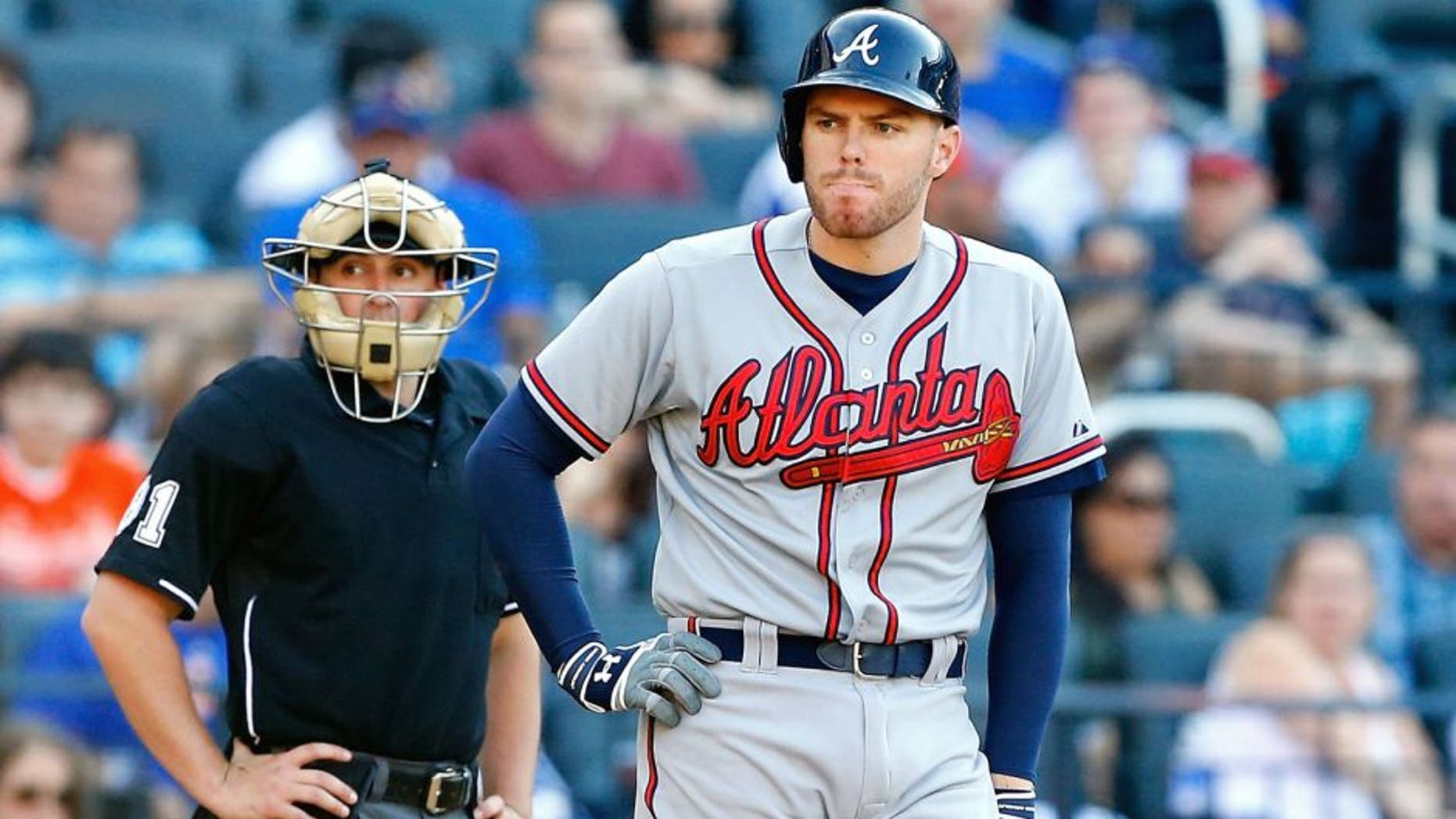 NEW YORK, NY - JUNE 13: Freddie Freeman #5 of the Atlanta Braves in action against the New York Mets at Citi Field on June 13, 2015 in the Flushing neighborhood of the Queens borough of New York City. The Braves defeated the Mets 5-3 in eleven innings. (Photo by Jim McIsaac/Getty Images)