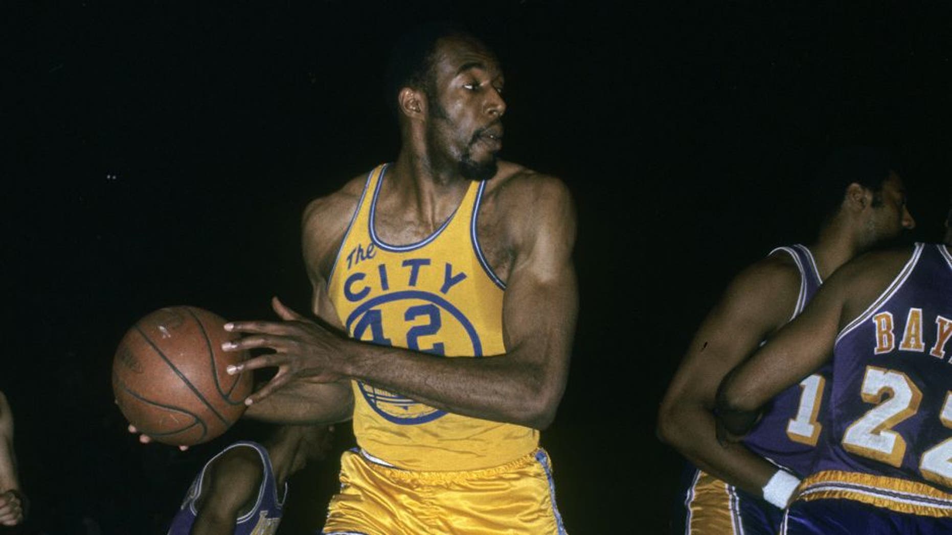 SAN FRANCISCO, CA - CIRCA 1960's: Nate Thurmond #42 of the San Francisco Warriors in action pulling down a rebound against the Los Angeles Lakers during an late circa 1960's NBA basketball game at the Cow Palace in San Francisco, California. Thurmond played for the Warriors 1963-74. (Photo by Focus on Sport/Getty Images)