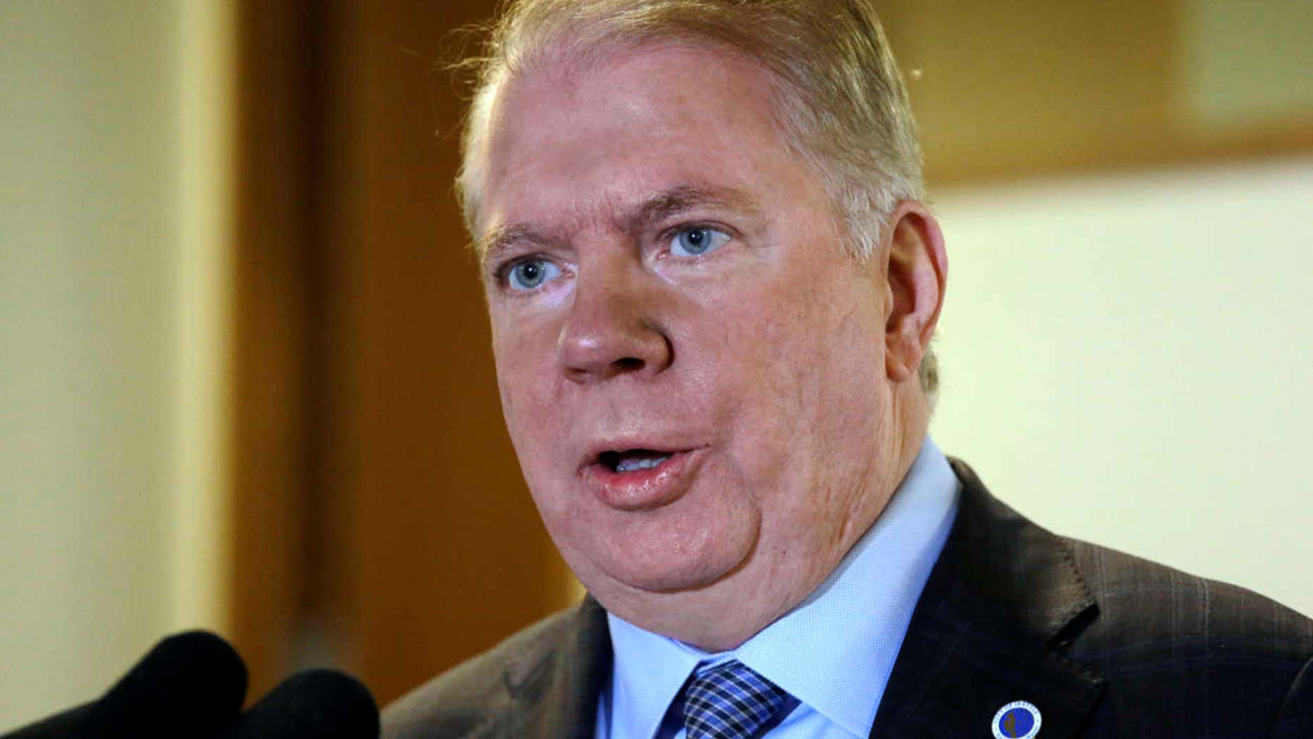 FILE - In this April 7, 2017, file photo, Seattle Mayor Ed Murray reads a statement to media members in Seattle after a lawsuit was filed that accused Murray of sexually molesting a teenage high-school dropout in the 1980s.