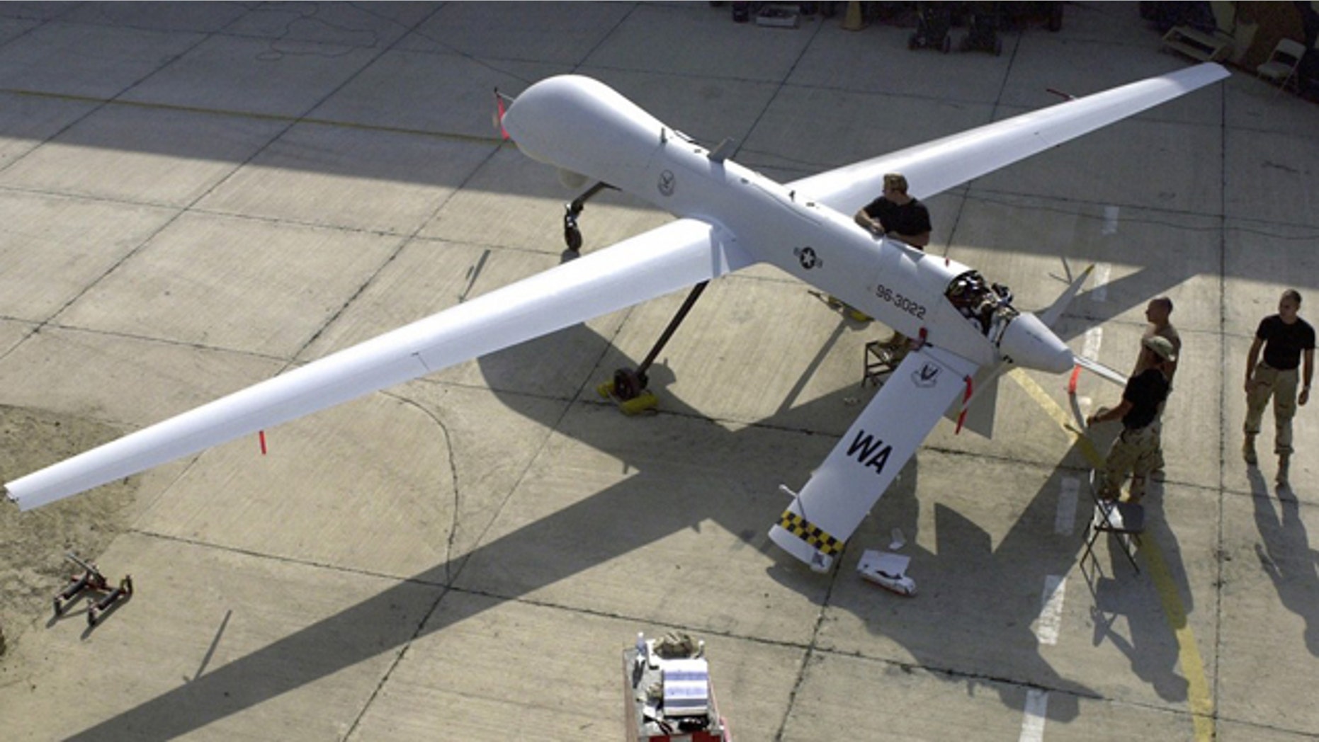 FILE: Members of the 11th Reconnaissance Squadron from Indian Springs, Nev., perform pre-flight checks on a Predator unmanned aerial vehicle prior to a mission.