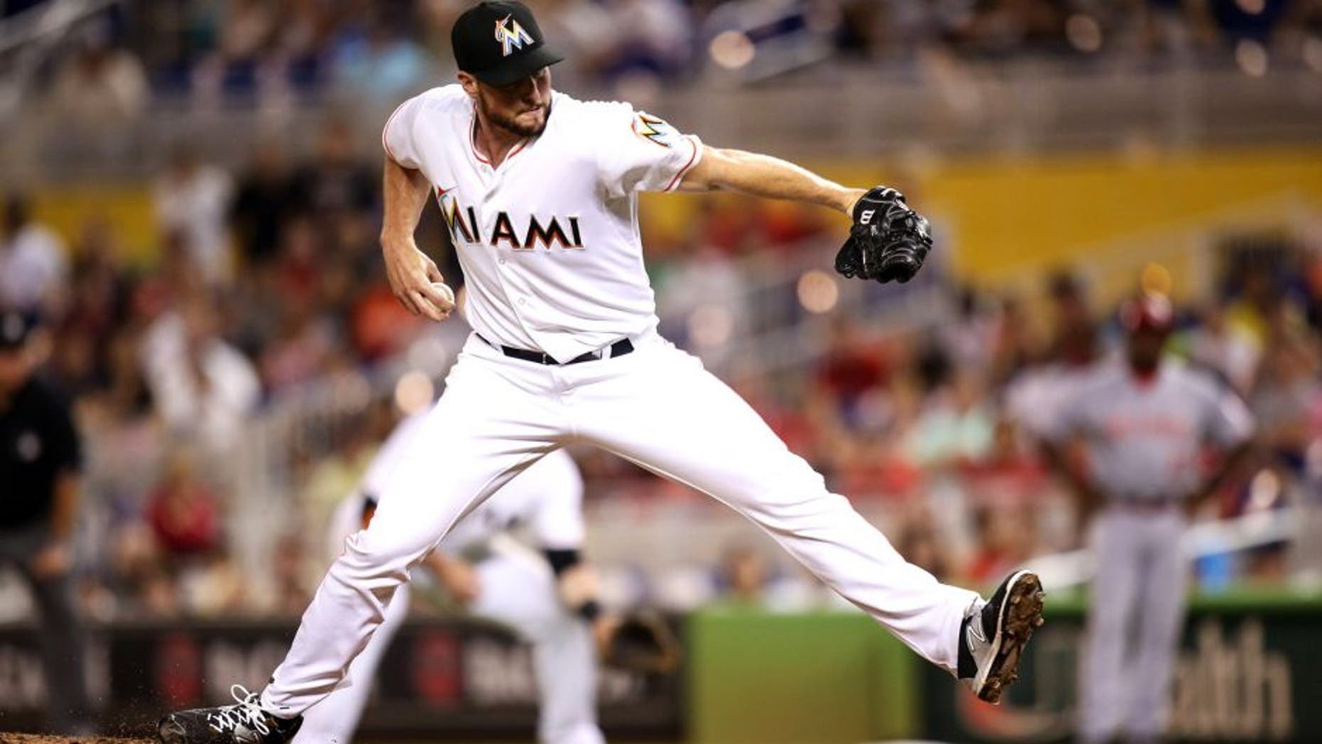 MIAMI, FL - JULY 09: Carter Capps #22 of the Miami Marlins in action during the game against the Cincinnati Reds at Marlins Park on July 9, 2015 in Miami, Florida. (Photo by Rob Foldy/Getty Images)