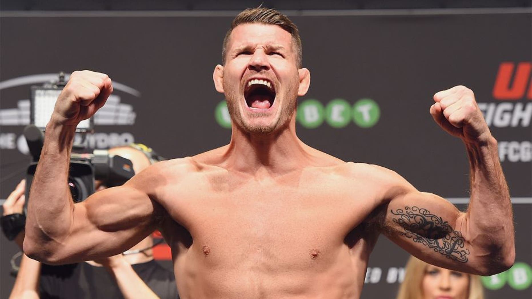 GLASGOW, SCOTLAND - JULY 17: Michael Bisping of England steps on the scale during the UFC weigh-in inside the SSE Hydro on July 17, 2015 in Glasgow, Scotland. (Photo by Josh Hedges/Zuffa LLC/Zuffa LLC via Getty Images)