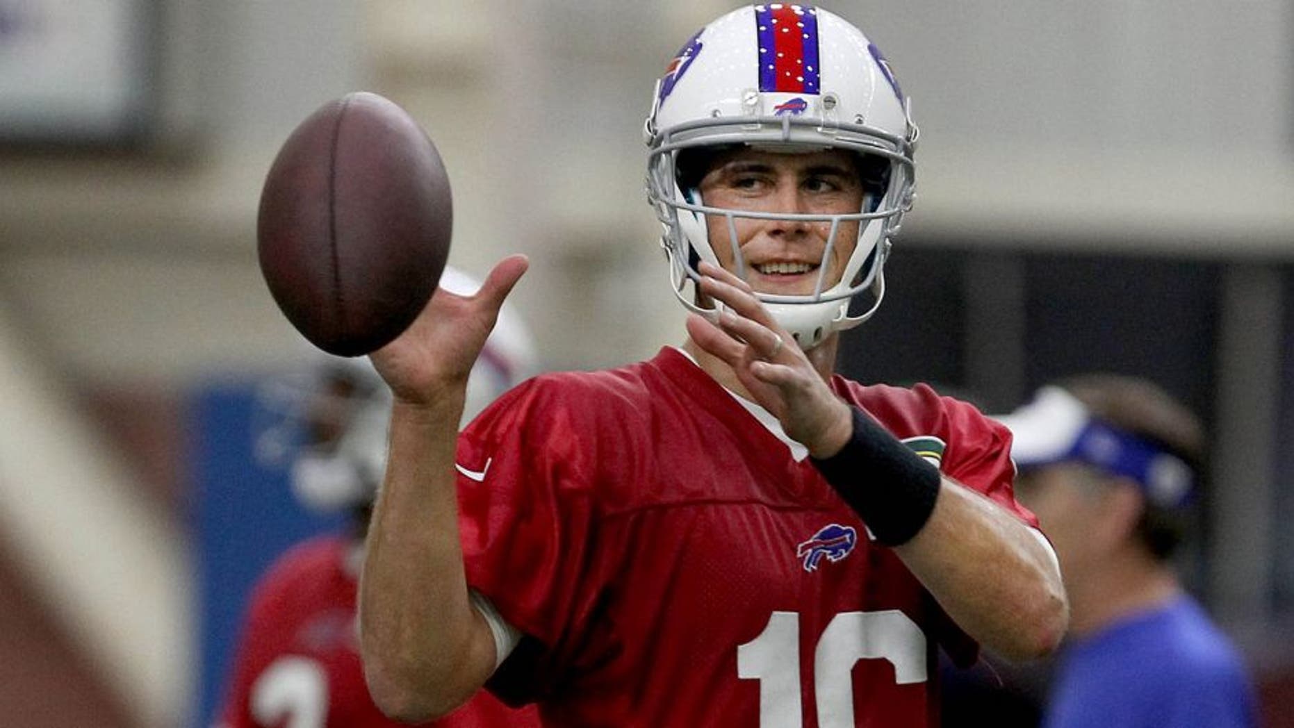Jun 16, 2015; Buffalo, NY, USA; Buffalo Bills quarterback Matt Cassel (16) catches a ball during minicamp at Ralph Wilson Fieldhouse. Mandatory Credit: Timothy T. Ludwig-USA TODAY Sports
