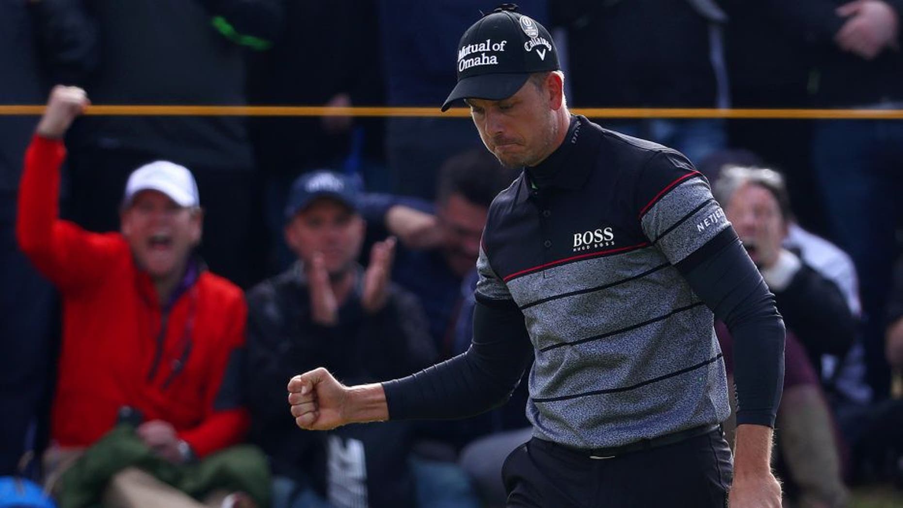 TROON, SCOTLAND - JULY 17: Henrik Stenson of Sweden celebrates a putt on the 14th during the final round on day four of the 145th Open Championship at Royal Troon on July 17, 2016 in Troon, Scotland. (Photo by Matthew Lewis/Getty Images)