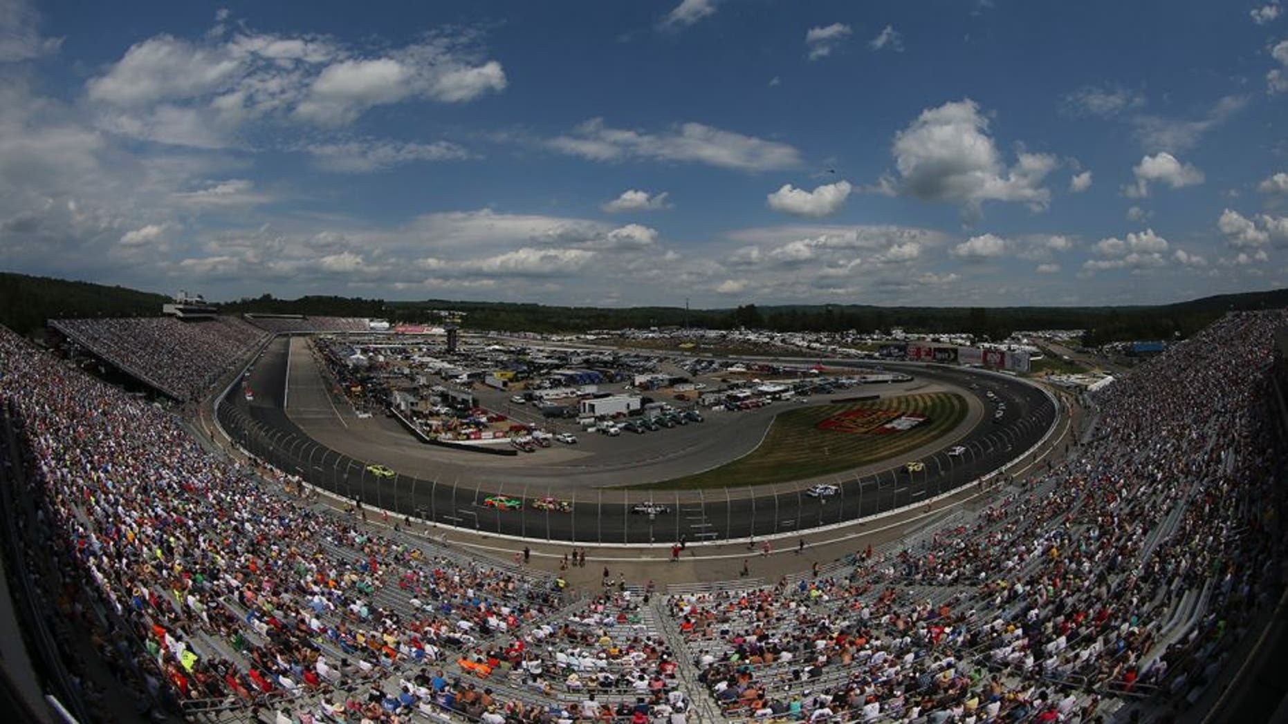 Drivers race during the NASCAR Sprint Cup Series 5-Hour ENERGY 301 at New Hampshire Motor Speedway on July 19, 2015 in Loudon, New Hampshire.
