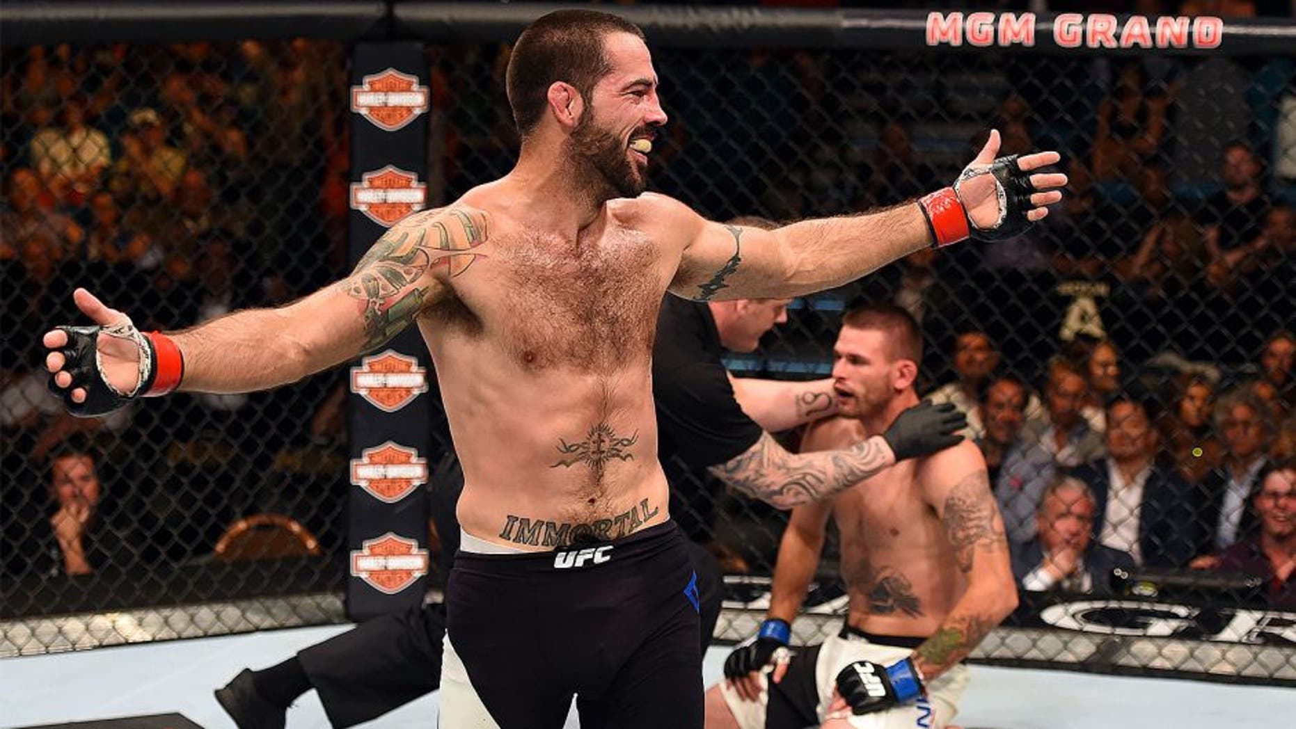 LAS VEGAS, NV - JULY 11: Matt Brown reacts to his victory over Tim Means in their welterweight fight during the UFC 189 event inside MGM Grand Garden Arena on July 11, 2015 in Las Vegas, Nevada. (Photo by Josh Hedges/Zuffa LLC/Zuffa LLC via Getty Images)