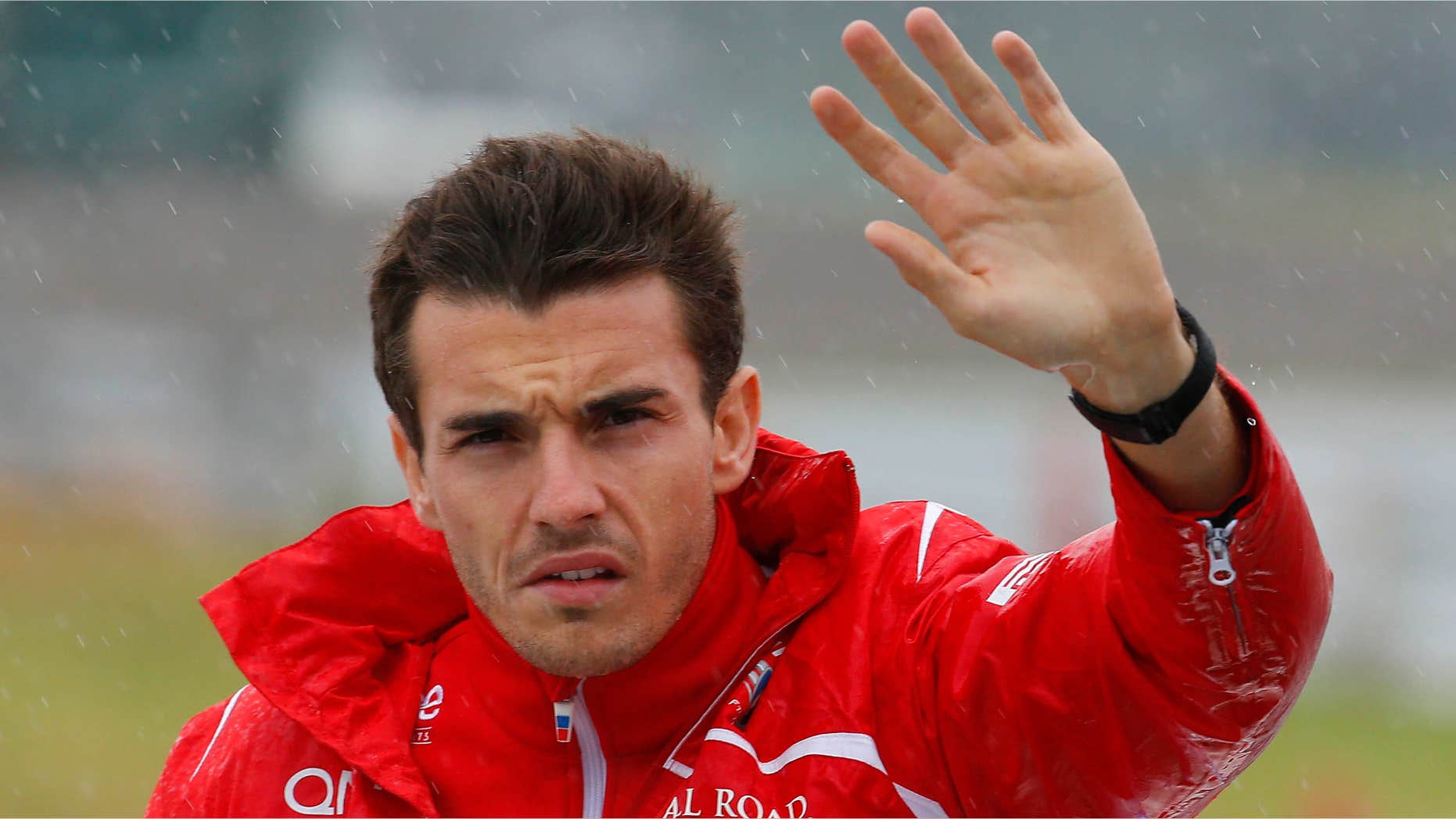 Oct. 5, 2014: Marussia driver Jules Bianchi of France waves during drivers' parade before the Japanese Formula One Grand Prix at the Suzuka Circuit in Suzuka, central Japan.