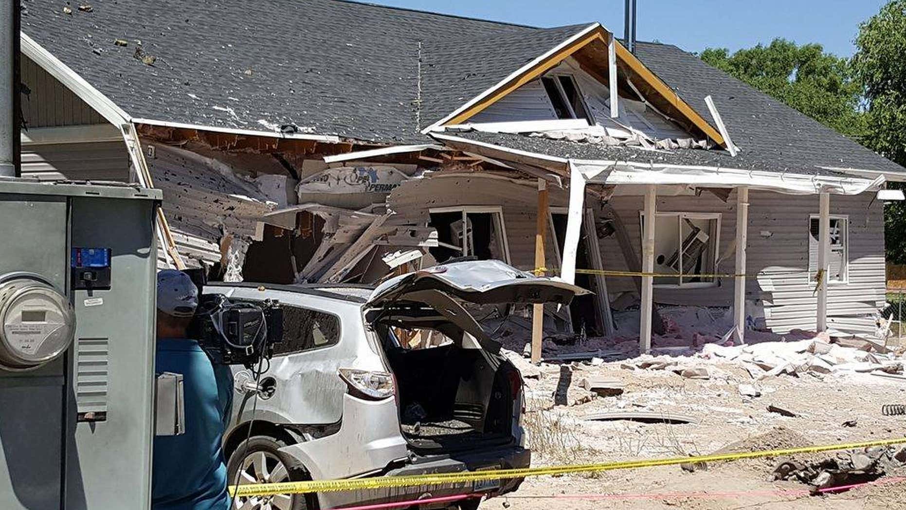 This July 14, 2016 photo provided by Dennis Sanders shows a house in Panaca, Nev. after it was destroyed by explosives.