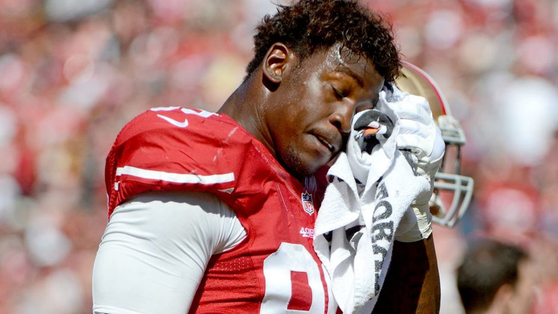 September 22, 2013; San Francisco, CA, USA; San Francisco 49ers outside linebacker Aldon Smith (99) walks off the field after the second quarter against the Indianapolis Colts at Candlestick Park. Mandatory Credit: Kyle Terada-USA TODAY Sports