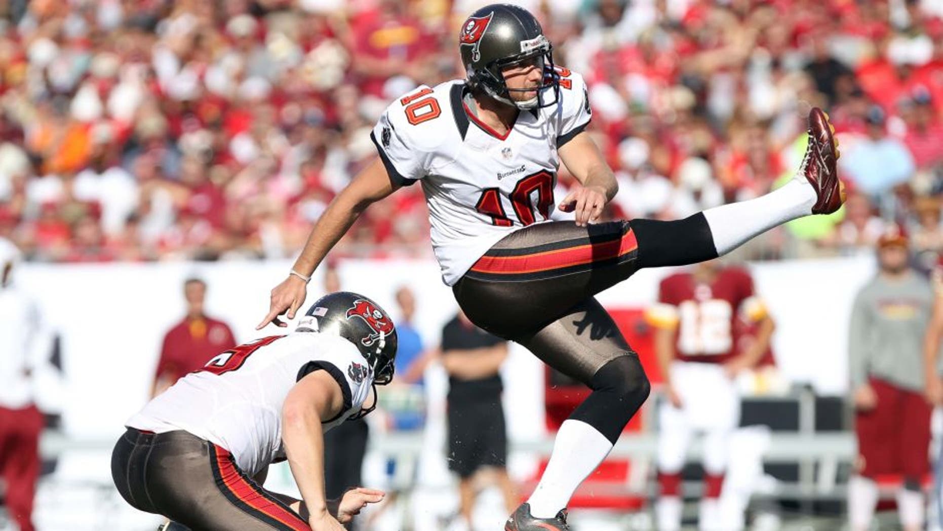 September 30, 2012; Tampa, FL, USA; Tampa Bay Buccaneers kicker Connor Barth (10) kicks a field goal during the first quarter against the Washington Redskins at Raymond James Stadium. Mandatory Credit: Kim Klement-USA TODAY Sports