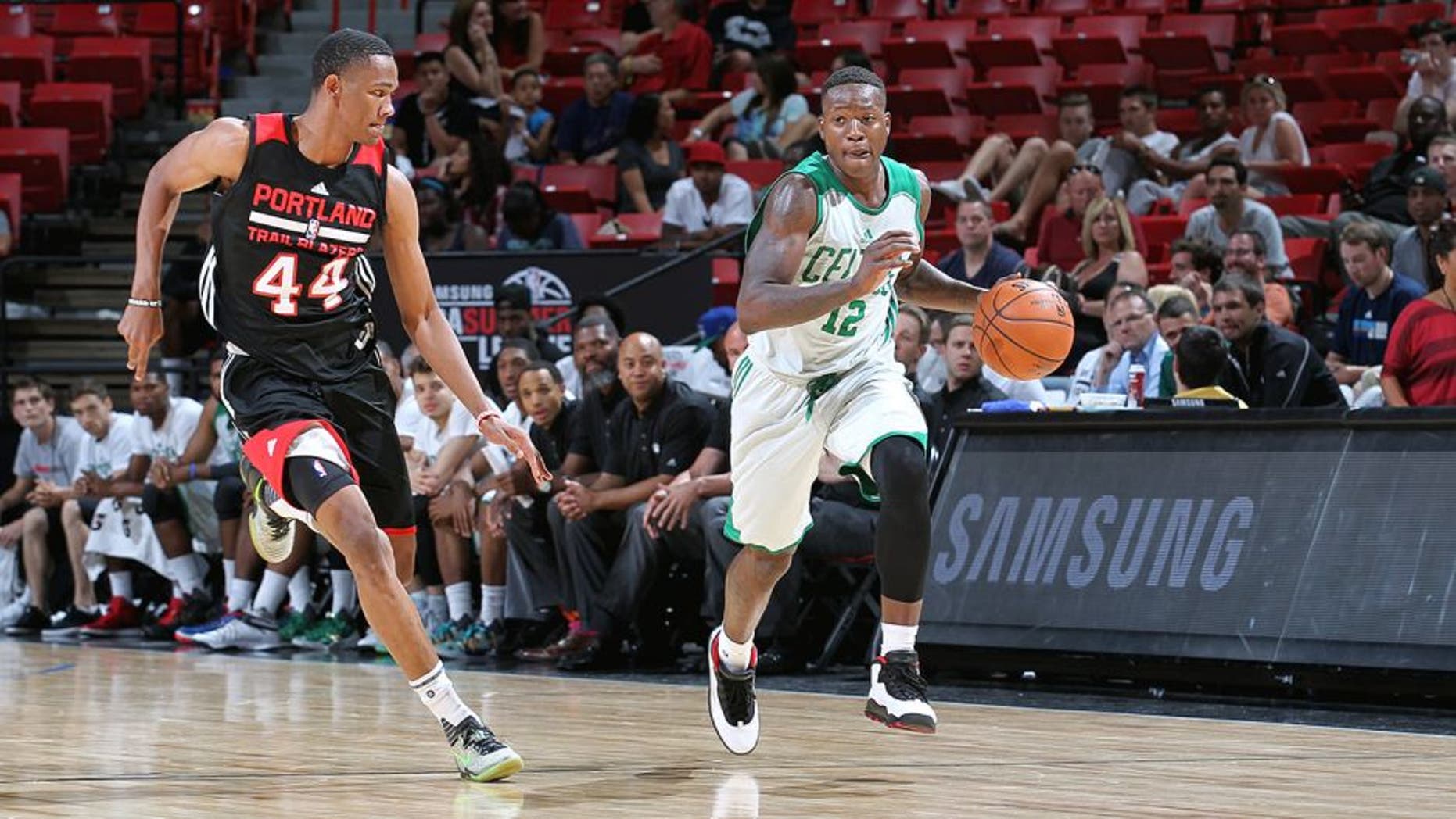 LAS VEGAS, NV - JULY 16: Terry Rozier #12 of the Boston Celtics drives to the basket against the Portland Trail Blazers during the game on July 16, 2015 at Thomas And Mack Center, Las Vegas, Nevada. NOTE TO USER: User expressly acknowledges and agrees that, by downloading and or using this Photograph, user is consenting to the terms and conditions of the Getty Images License Agreement. Mandatory Copyright Notice: Copyright 2015 NBAE (Photo by Jack Arent/NBAE via Getty Images)