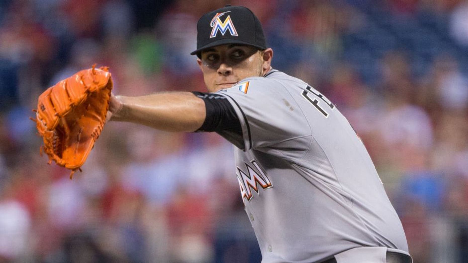Jul 17, 2015; Philadelphia, PA, USA; Miami Marlins starting pitcher Jose Fernandez (16) pitches against the Philadelphia Phillies at Citizens Bank Park. The Phillies won 6-3. Mandatory Credit: Bill Streicher-USA TODAY Sports