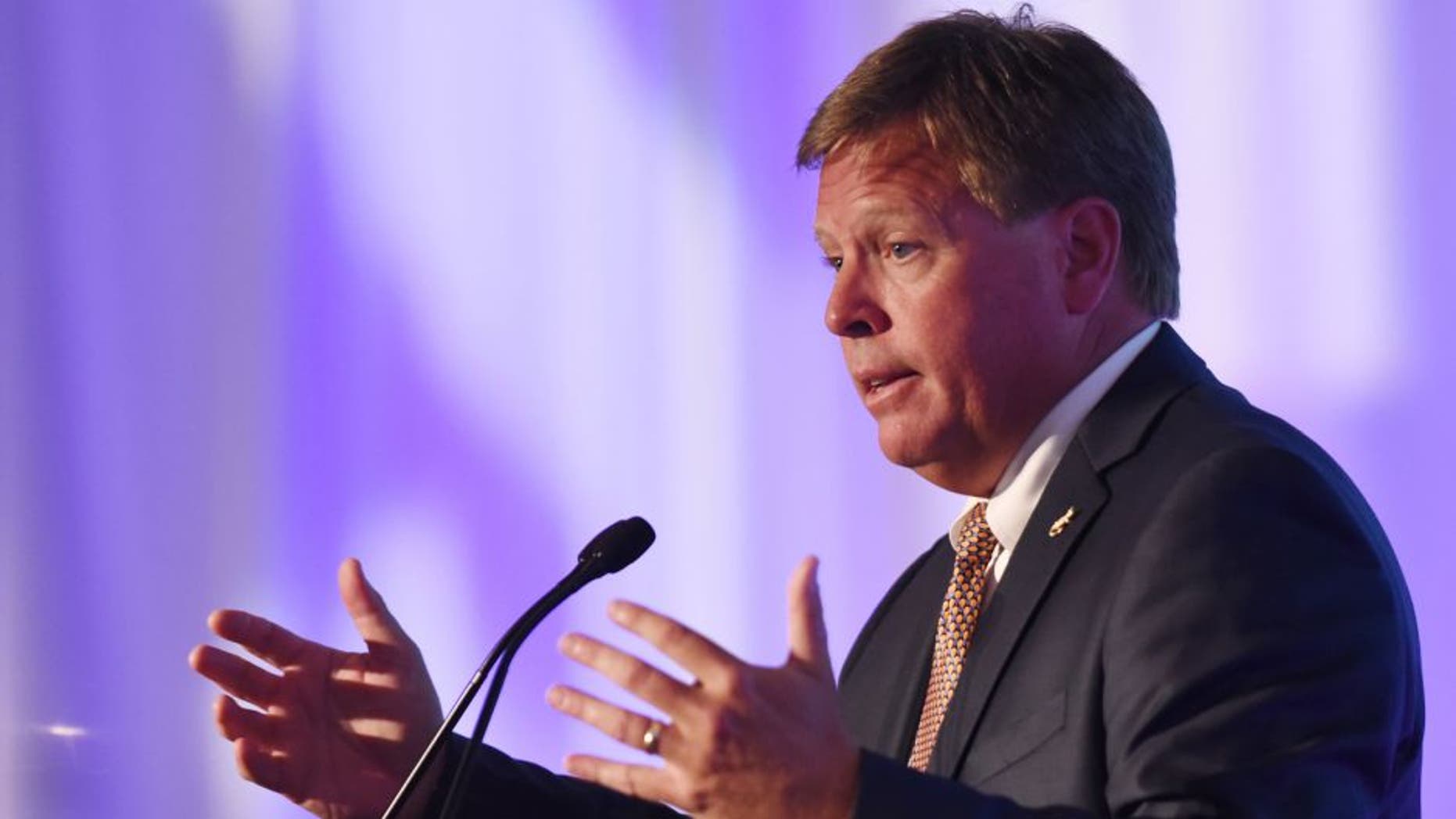 Jul 13, 2015; Hoover, AL, USA; Florida Gators football coach Jim McElwain fields questions during SEC media days at the Wynfrey Hotel. Mandatory Credit: Kelly Lambert-USA TODAY Sports