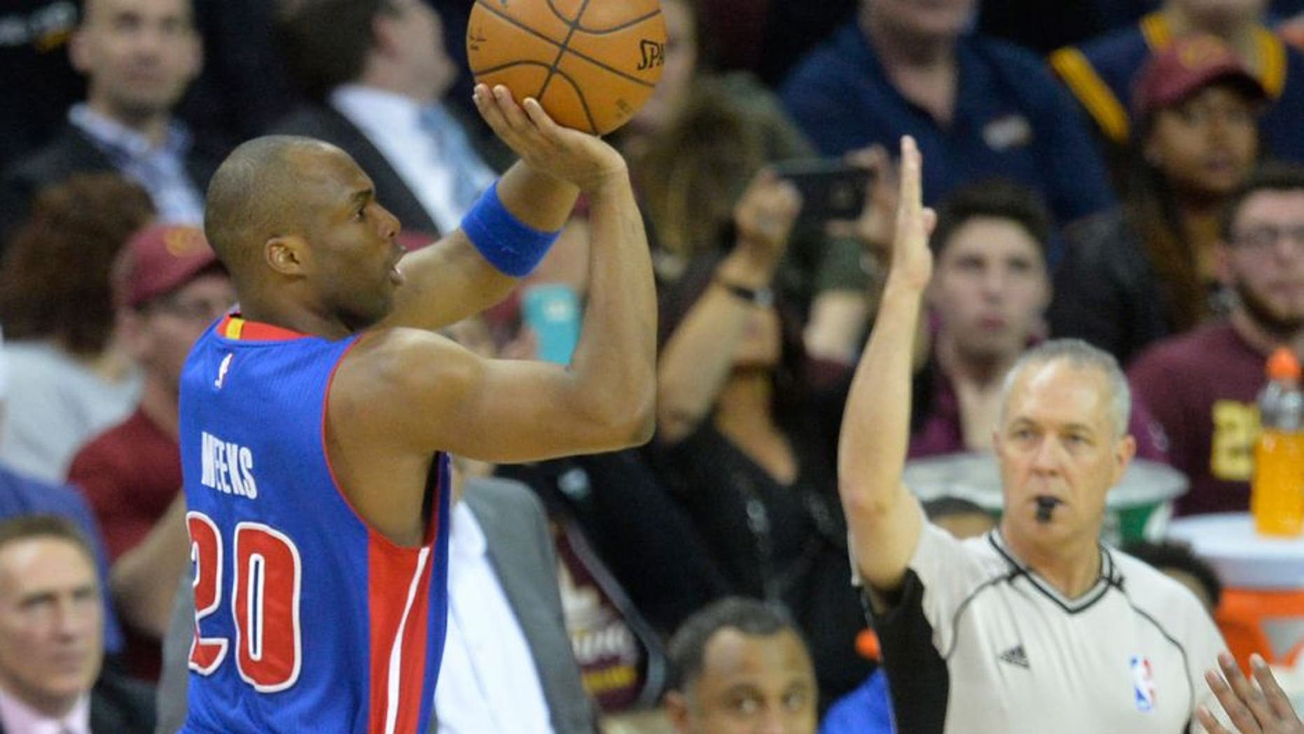 Apr 13, 2016; Cleveland, OH, USA; Detroit Pistons guard Jodie Meeks (20) attempts a three-point basket in the second quarter against the Cleveland Cavaliers at Quicken Loans Arena. Mandatory Credit: David Richard-USA TODAY Sports