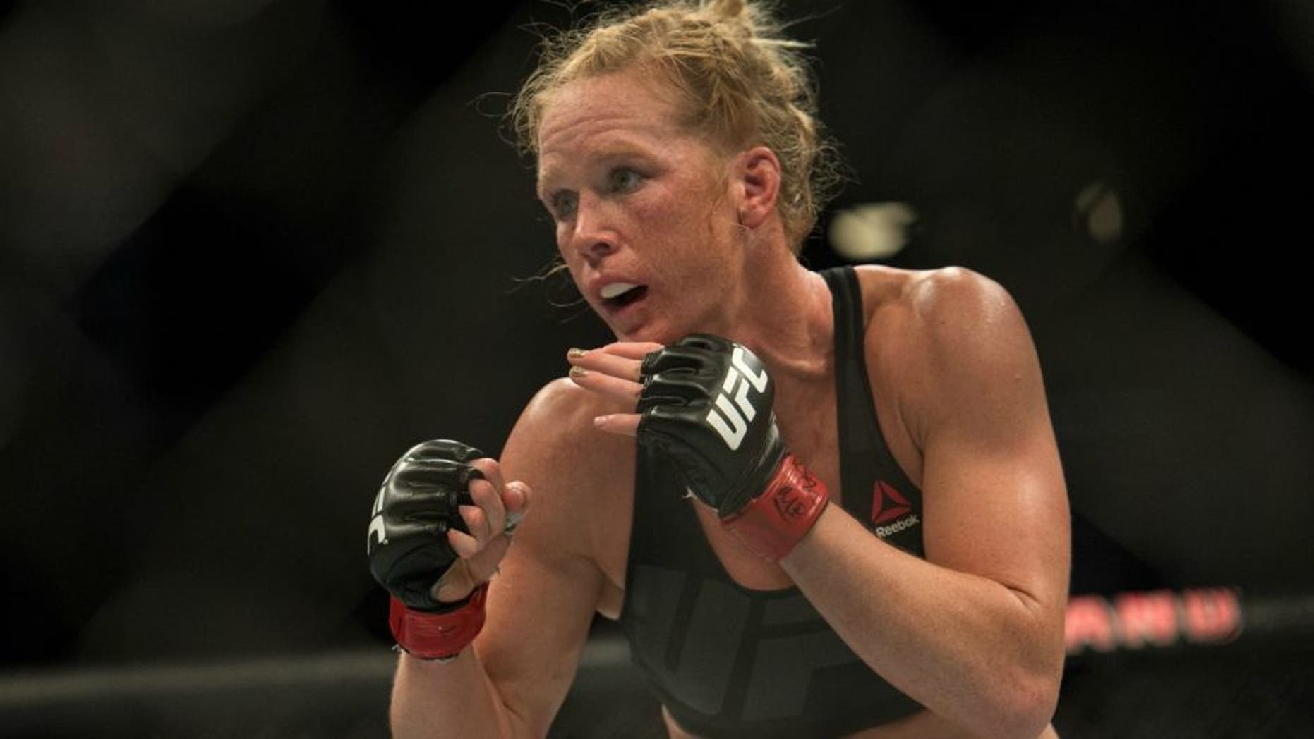 LAS VEGAS, NV - MARCH 5: (R-L) Holly Holm circles Miesha Tate during their women's bantamweight championship bout during the UFC 196 in the MGM Grand Garden Arena on March 5, 2016 in Las Vegas, Nevada. (Photo by Brandon Magnus/Zuffa LLC/Zuffa LLC via Getty Images)