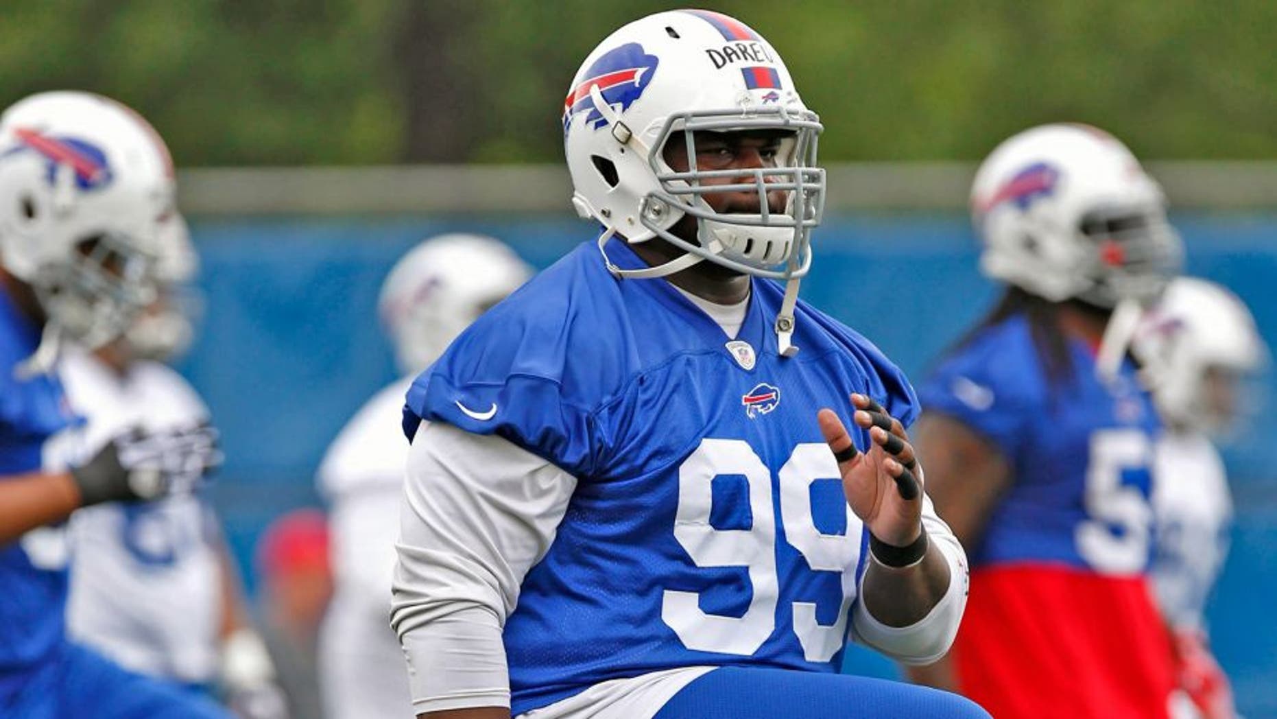 Jun 18, 2014; Buffalo, NY, USA; Buffalo Bills defensive line Marcell Dareus (99) warms up during the Bills Minicamp at Ralph Wilson Stadium. Mandatory Credit: Kevin Hoffman-USA TODAY Sports