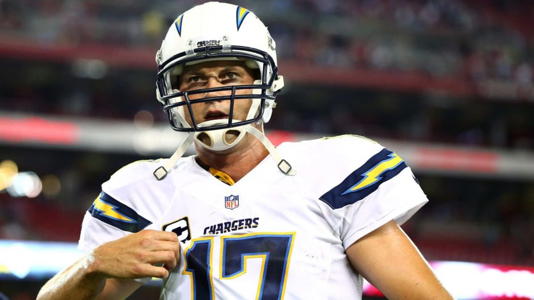 Sep 8, 2014; Glendale, AZ, USA; San Diego Chargers quarterback Philip Rivers (17) against the Arizona Cardinals at University of Phoenix Stadium. The Cardinals defeated the Chargers 18-17. Mandatory Credit: Mark J. Rebilas-USA TODAY Sports