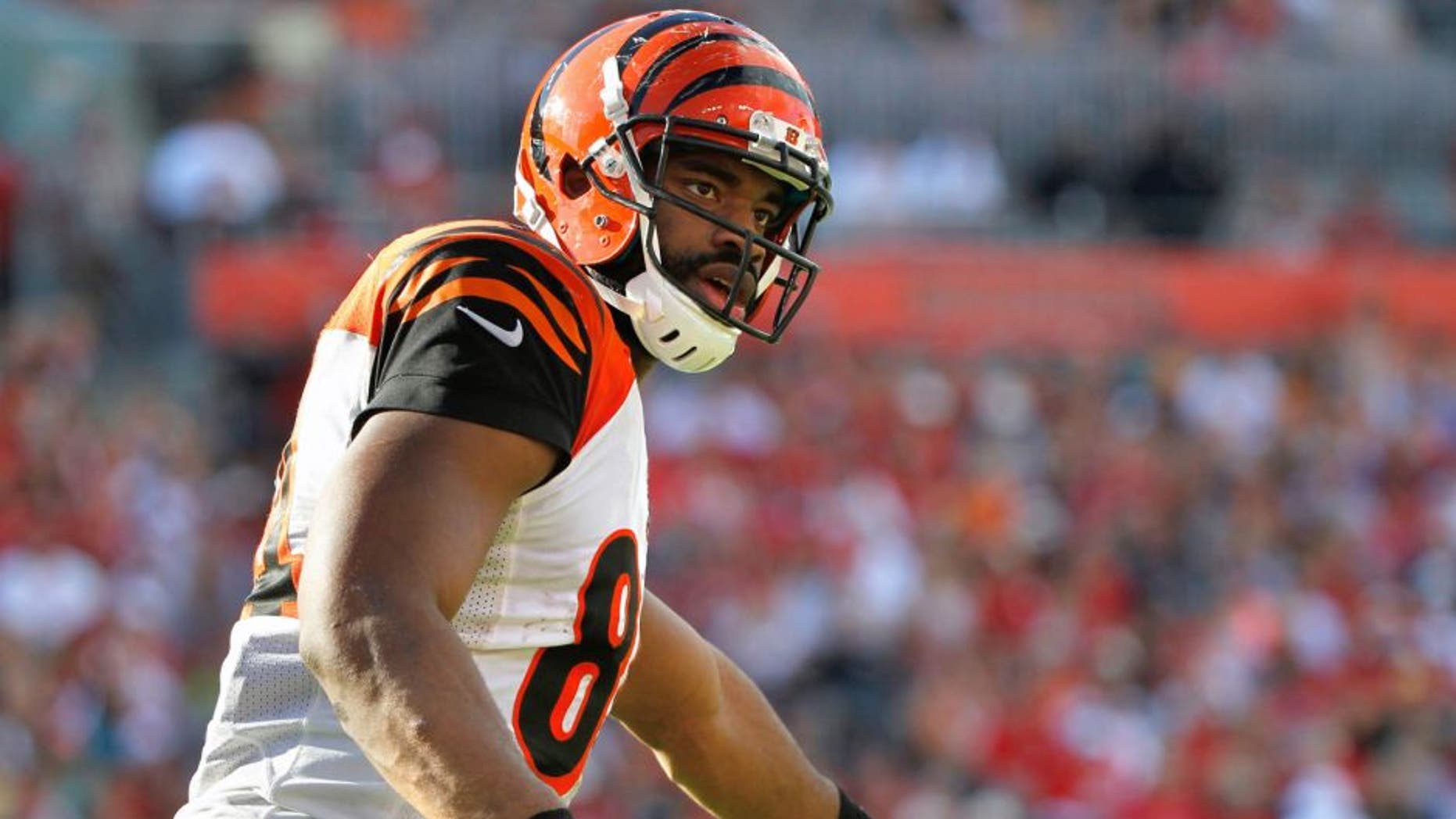 Nov 30, 2014; Tampa, FL, USA; Cincinnati Bengals tight end Jermaine Gresham (84) points against the Tampa Bay Buccaneers during the second half at Raymond James Stadium. Cincinnati Bengals defeated the Tampa Bay Buccaneers 14-13. Mandatory Credit: Kim Klement-USA TODAY Sports