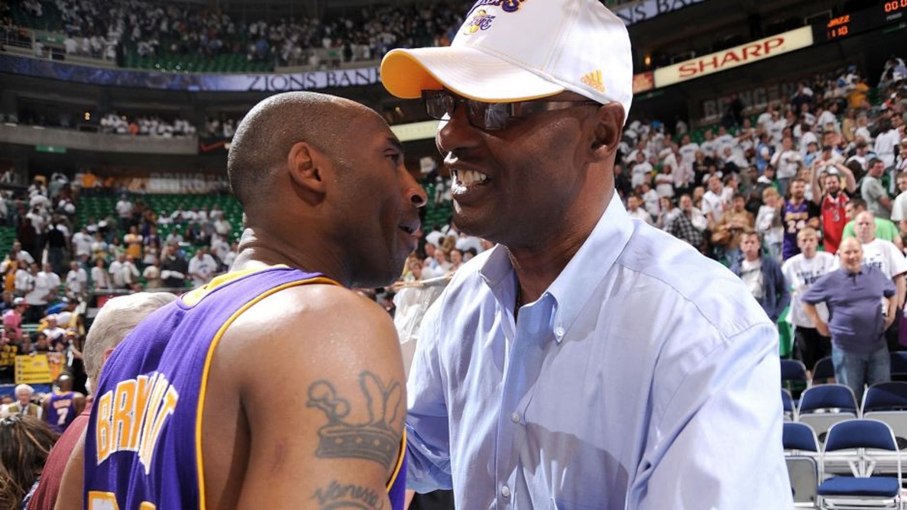 SALT LAKE CITY - MAY 8: Kobe Bryant #24 of the Los Angeles Lakers hugs his dad Joe Bryant after their win against the Utah Jazz in Game Three of the Western Conference Semifinals during the 2010 NBA Playoffs at the EnergySolutions Arena on May 8, 2010 in Salt Lake City, Utah. NOTE TO USER: User expressly acknowledges and agrees that, by downloading and/or using this Photograph, user is consenting to the terms and conditions of the Getty Images License Agreement. Mandatory Copyright Notice: Copyright 2010 NBAE (Photo by Andrew D. Bernstein/NBAE via Getty Images) *** Local Caption *** Kobe Bryant;Joe Bryant