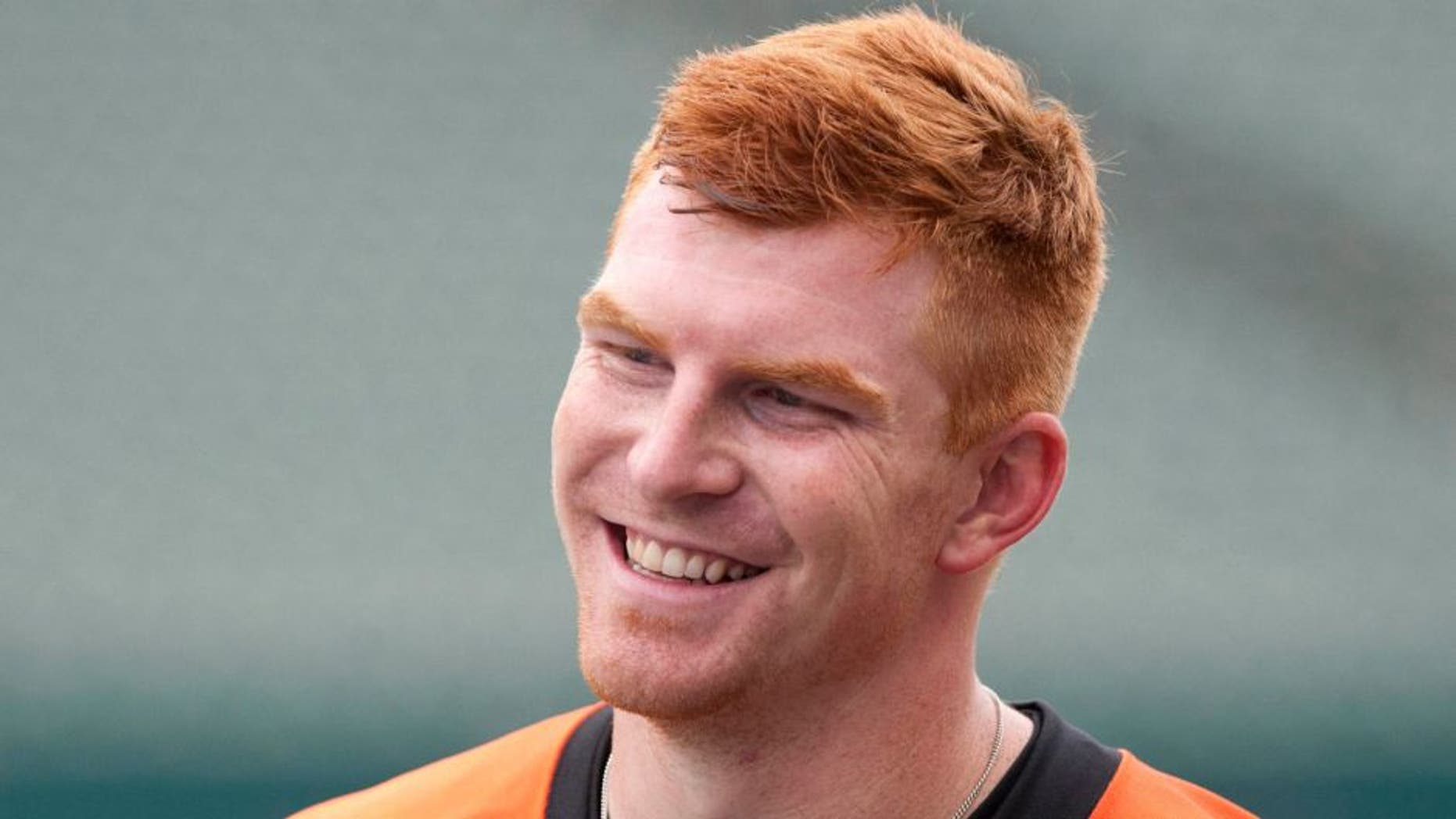 Jun 11, 2014; Cincinnati, OH, USA; Cincinnati Bengals quarterback Andy Dalton (14) during minicamp at Paul Brown Stadium. Mandatory Credit: Aaron Doster-USA TODAY Sports