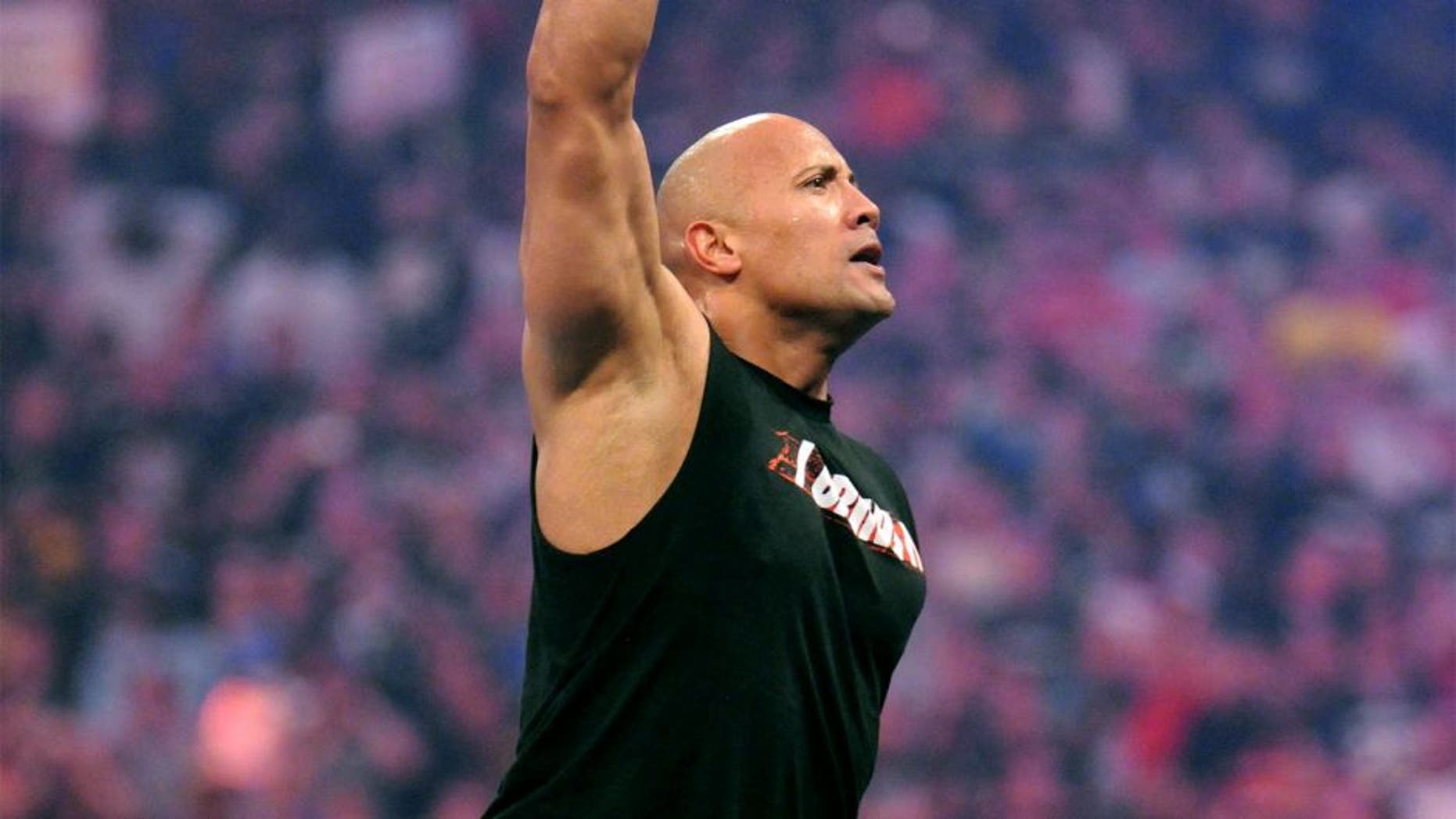 ATLANTA, GA - APRIL 03: Actor/wrestler Dwayne "The Rock" Johnson attends the WWE 2011 Hall Of Fame Induction at Georgia Dome on April 3, 2011 in Atlanta, Georgia. (Photo by George Napolitano/FilmMagic) *** Local Caption *** Dwayne Johnson
