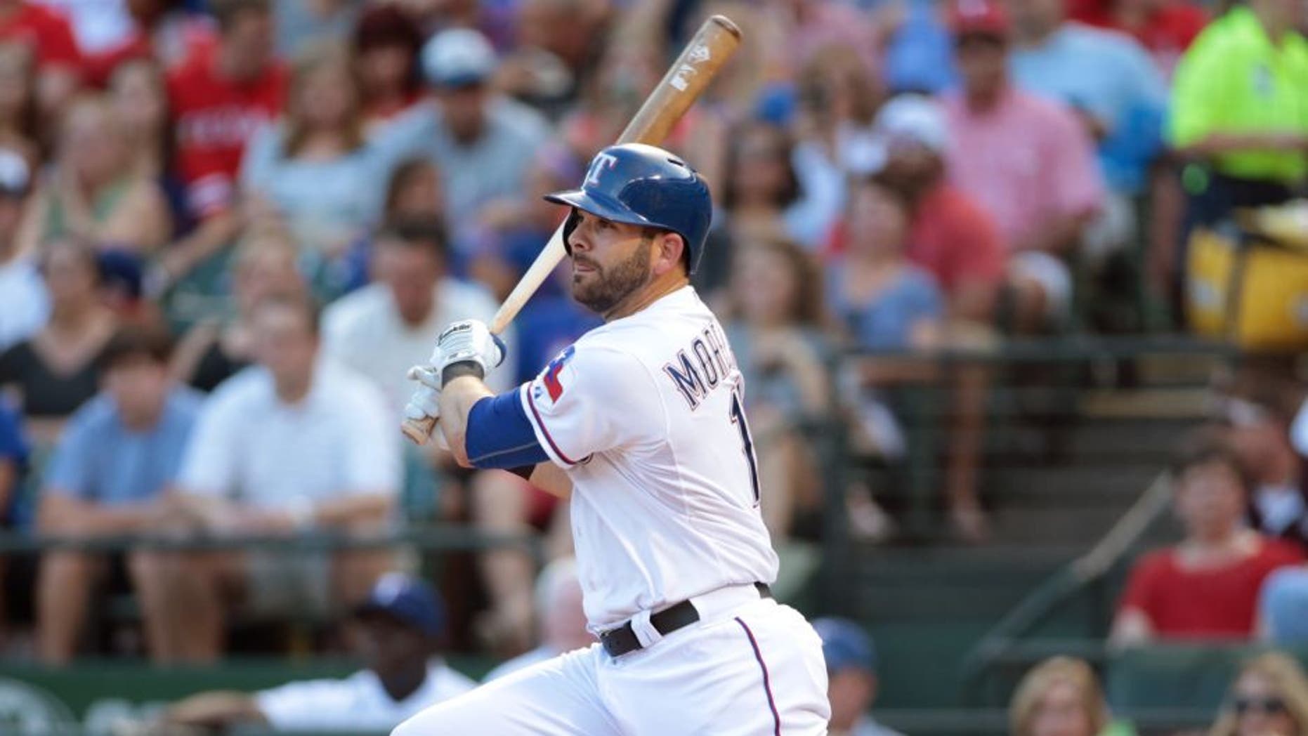 ARLINGTON, TX - JULY 3: Mitch Moreland #18 of the Texas Rangers hits in the first inning against the Los Angeles Angels of Anaheim at Rangers Ballpark in Arlington on July 3, 2015 in Arlington, Texas. (Photo by Rick Yeatts/Getty Images)