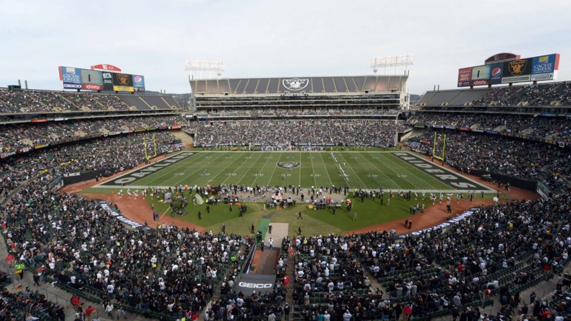 Nov 3, 2013; Oakland, CA, USA; General view of the opening kickoff between the Philadelphia Eagles and the Oakland Raiders at O.co Coliseum. The Eagles defeated the Raiders 49-20. Mandatory Credit: Kirby Lee-USA TODAY Sports