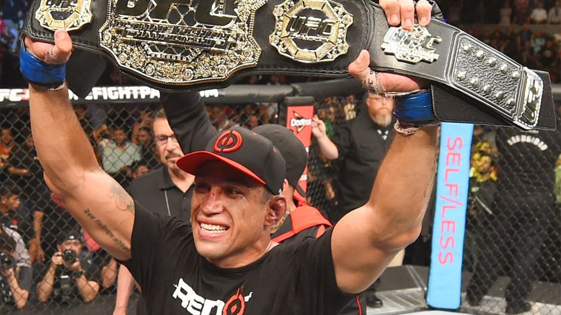 MEXICO CITY, MEXICO - JUNE 13: Fabricio Werdum of Brazil celebrates his submission victory over Cain Velasquez of the United States in their UFC heavyweight championship bout during the UFC 188 event inside the Arena Ciudad de Mexico on June 13, 2015 in Mexico City, Mexico. (Photo by Josh Hedges/Zuffa LLC/Zuffa LLC via Getty Images)