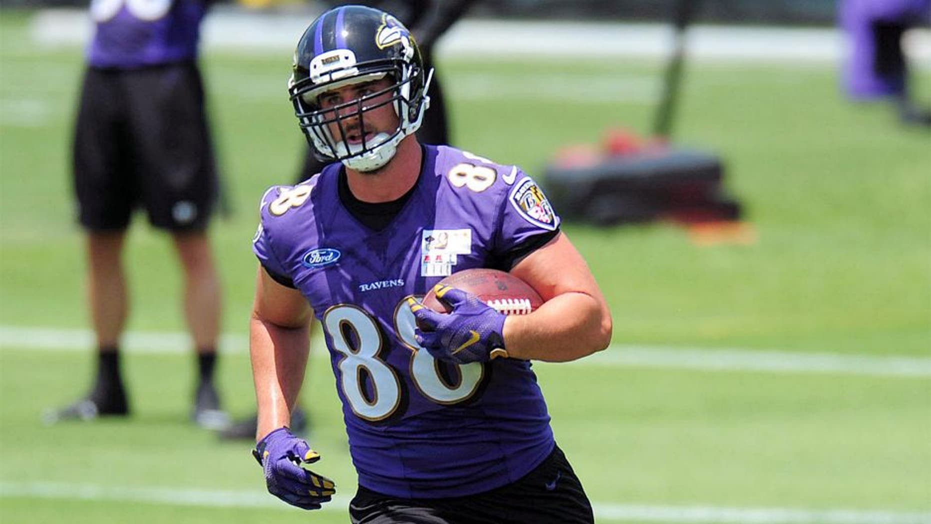 May 28, 2015; Baltimore, MD, USA; Baltimore Ravens tight end Dennis Pitta (88) runs with the ball during training camp at the Under Armour Performance Center. Mandatory Credit: Evan Habeeb-USA TODAY Sports