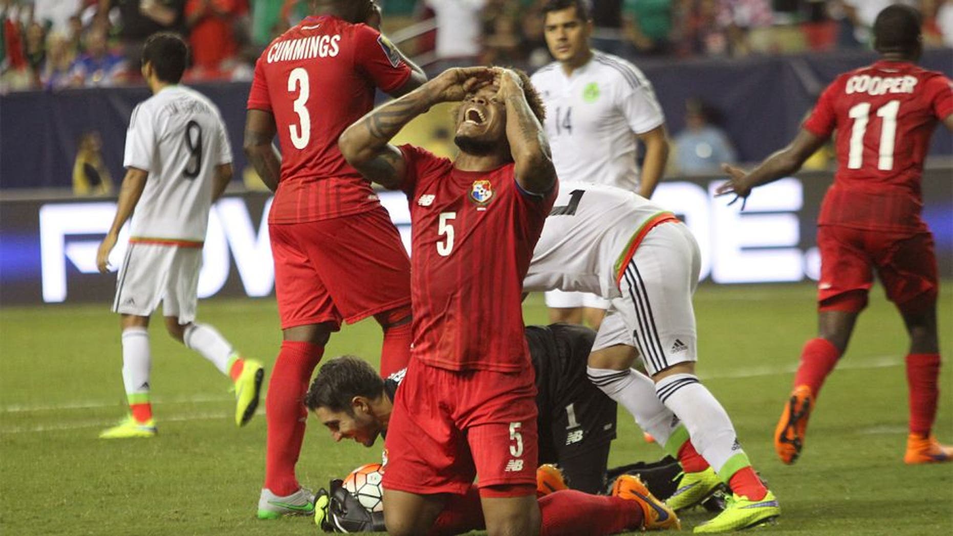 ATLANTA, UNITED STATES - July 22: Roman Torres of Panama reacts after the referee called a penalty during a semi final match between Mexico and Panama as part of Gold Cup 2015 at Georgia Dome on July 22, 2015 in Atlanta, United States. (Photo by Omar Vega/LatinContent/Getty Images)