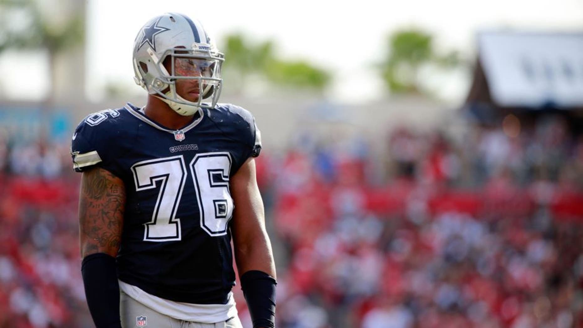 Nov 15, 2015; Tampa, FL, USA; Dallas Cowboys defensive end Greg Hardy (76) looks on against the Tampa Bay Buccaneers during the second half at Raymond James Stadium. Tampa Bay Buccaneers defeated the Dallas Cowboys 10-6. Mandatory Credit: Kim Klement-USA TODAY Sports