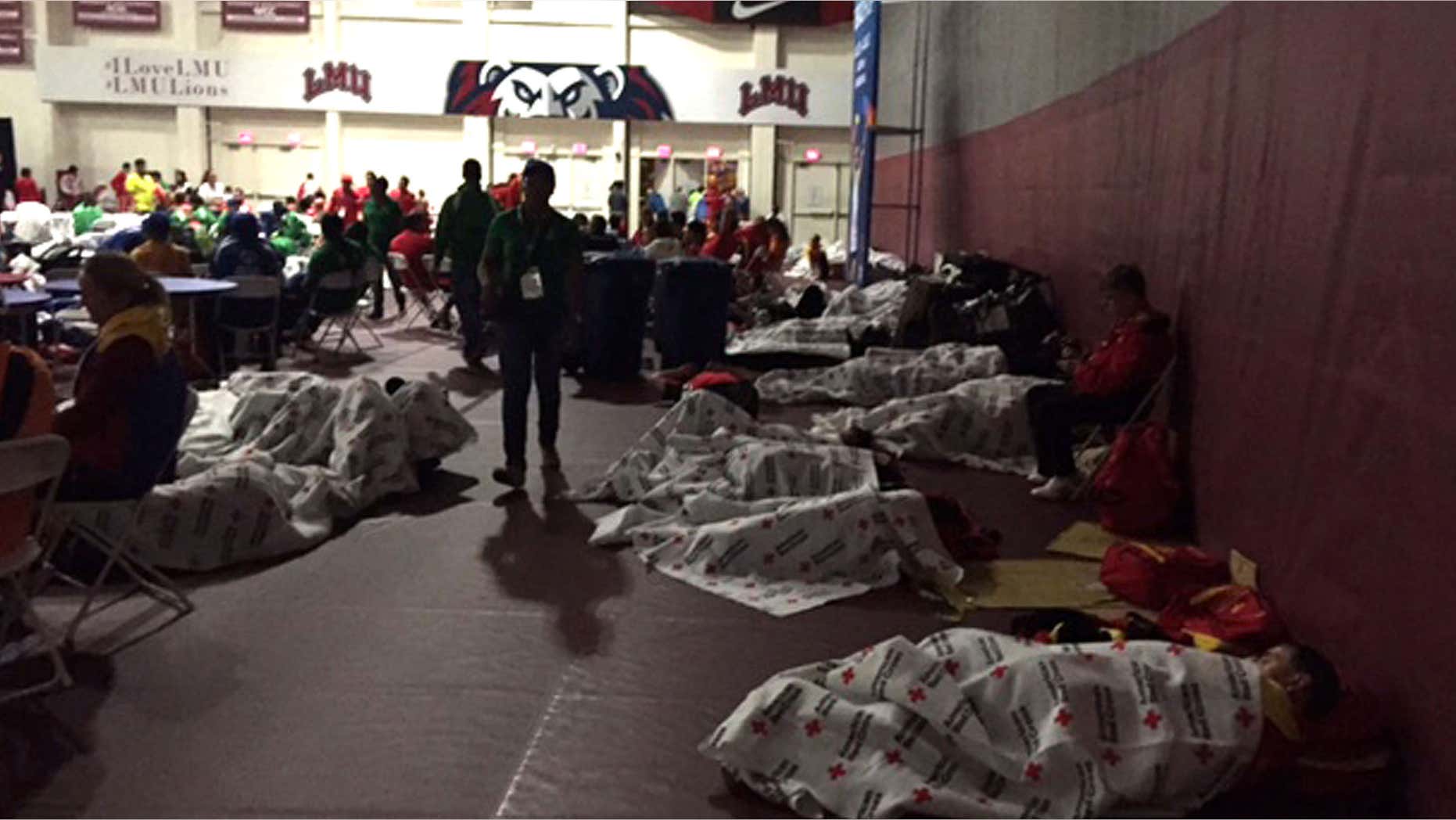 July 22, 2015: This photo provided by KNX1070 Newsradio shows Special Olympics competitors sleeping on the gymnasium floor at Loyola Marymount University in Los Angeles.