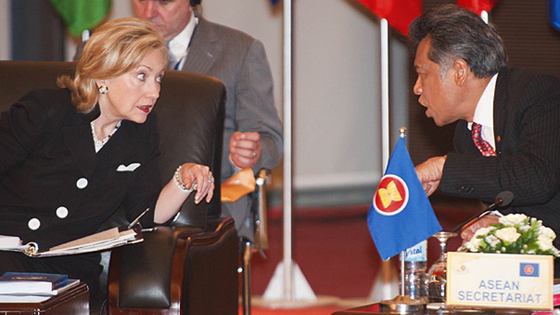July 23: Secretary of State Hillary Clinton speaks with ASEAN Secretary Surin Pitsuwan during 17th ASEAN Regional forum Retreat meeting in Hanoi.