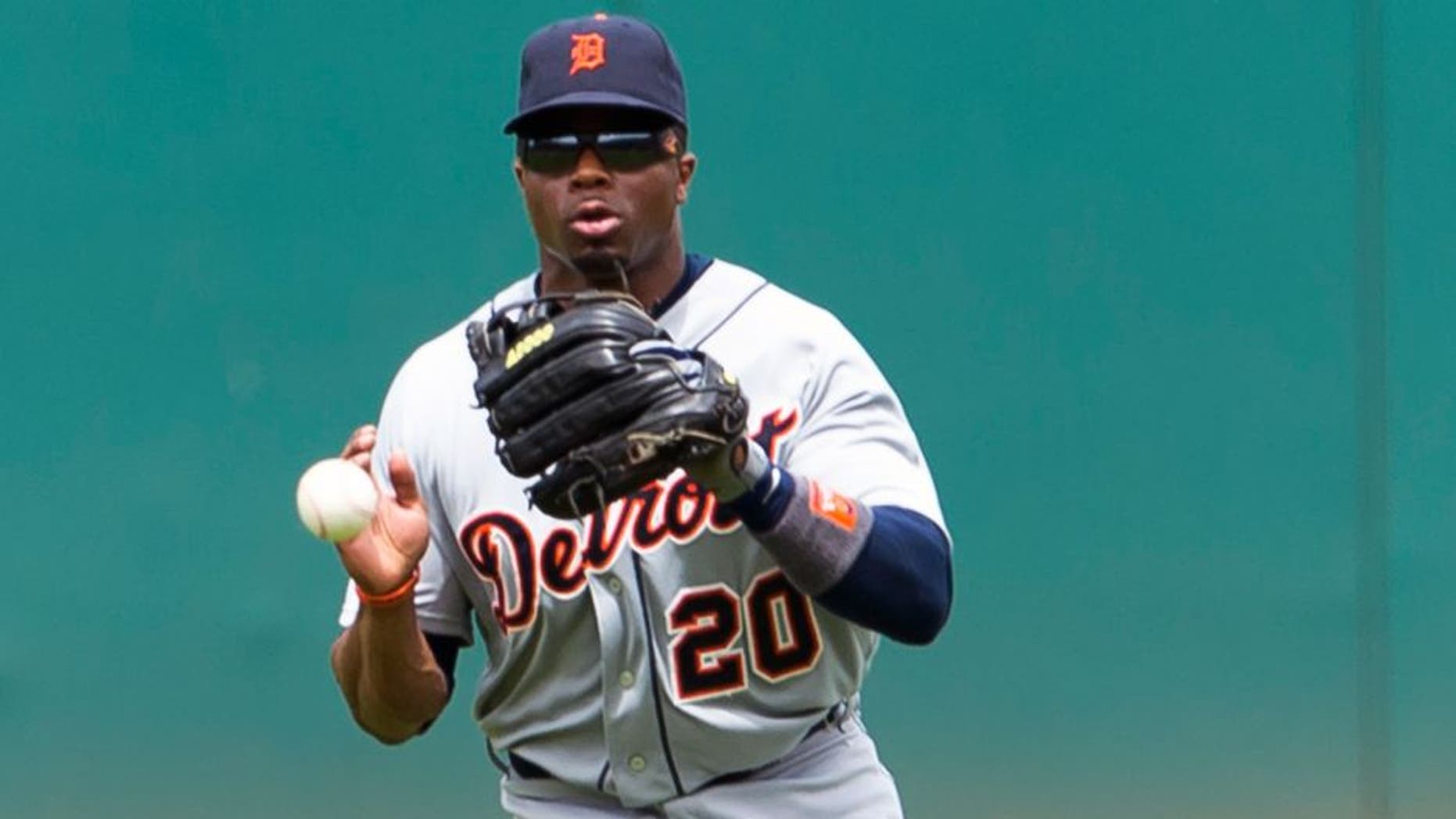 CLEVELAND, OH - JUNE 24: Center fielder Rajai Davis #20 of the Detroit Tigers fields a ground ball hit by Francisco Lindor #12 of the Cleveland Indians during the third inning at Progressive Field on June 24, 2015 in Cleveland, Ohio. (Photo by Jason Miller/Getty Images)