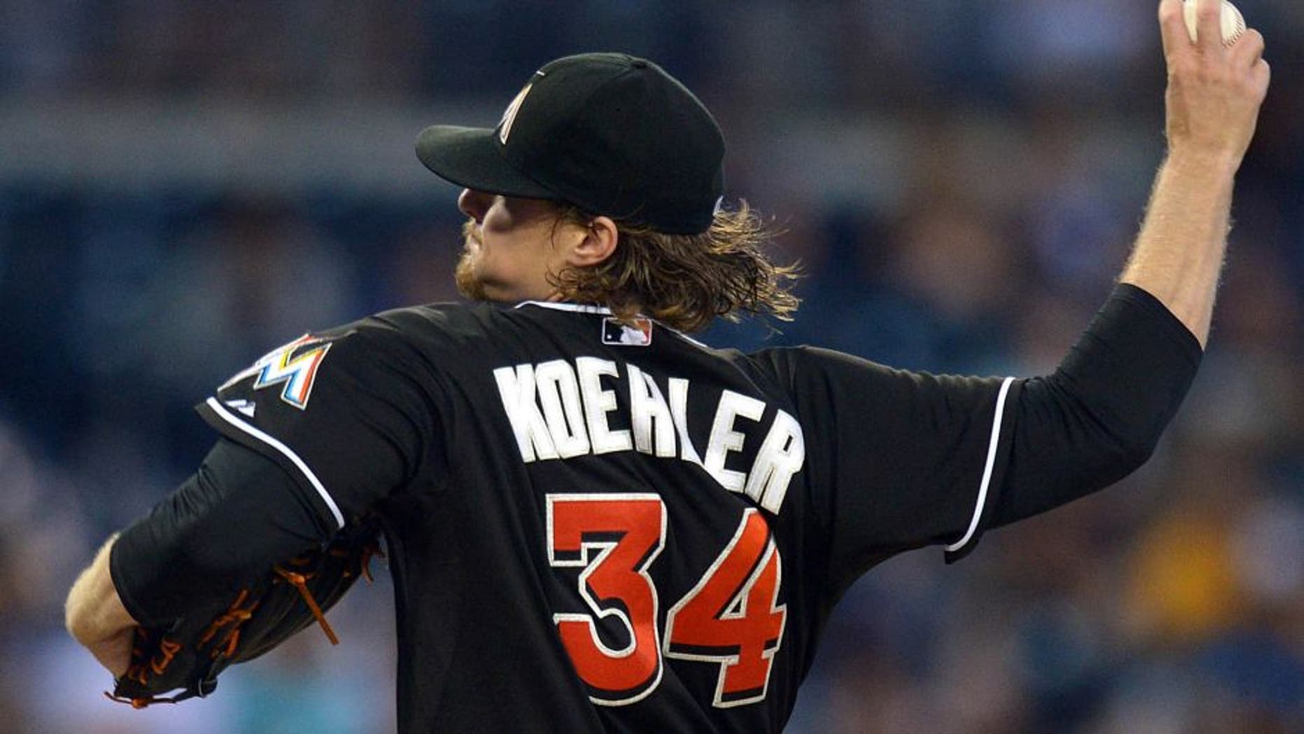 Jul 23, 2015; San Diego, CA, USA; Miami Marlins starting pitcher Tom Koehler (34) pitches against the San Diego Padres during the third inning at Petco Park. Mandatory Credit: Jake Roth-USA TODAY Sports