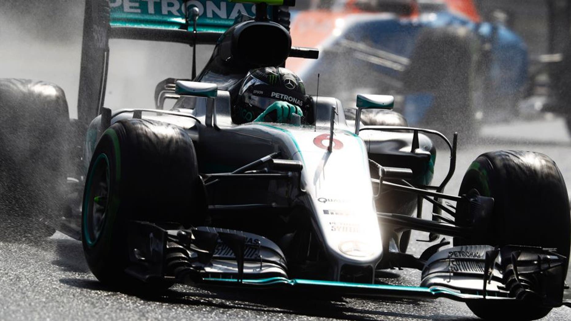 Hungaroring, Budapest, Hungary. Saturday 23 July 2016. Nico Rosberg, Mercedes F1 W07 Hybrid leads Pascal Wehrlein, Manor MRT 05 Mercedes. World Copyright: Steven Tee/LAT Photographic ref: Digital Image _H7I3902