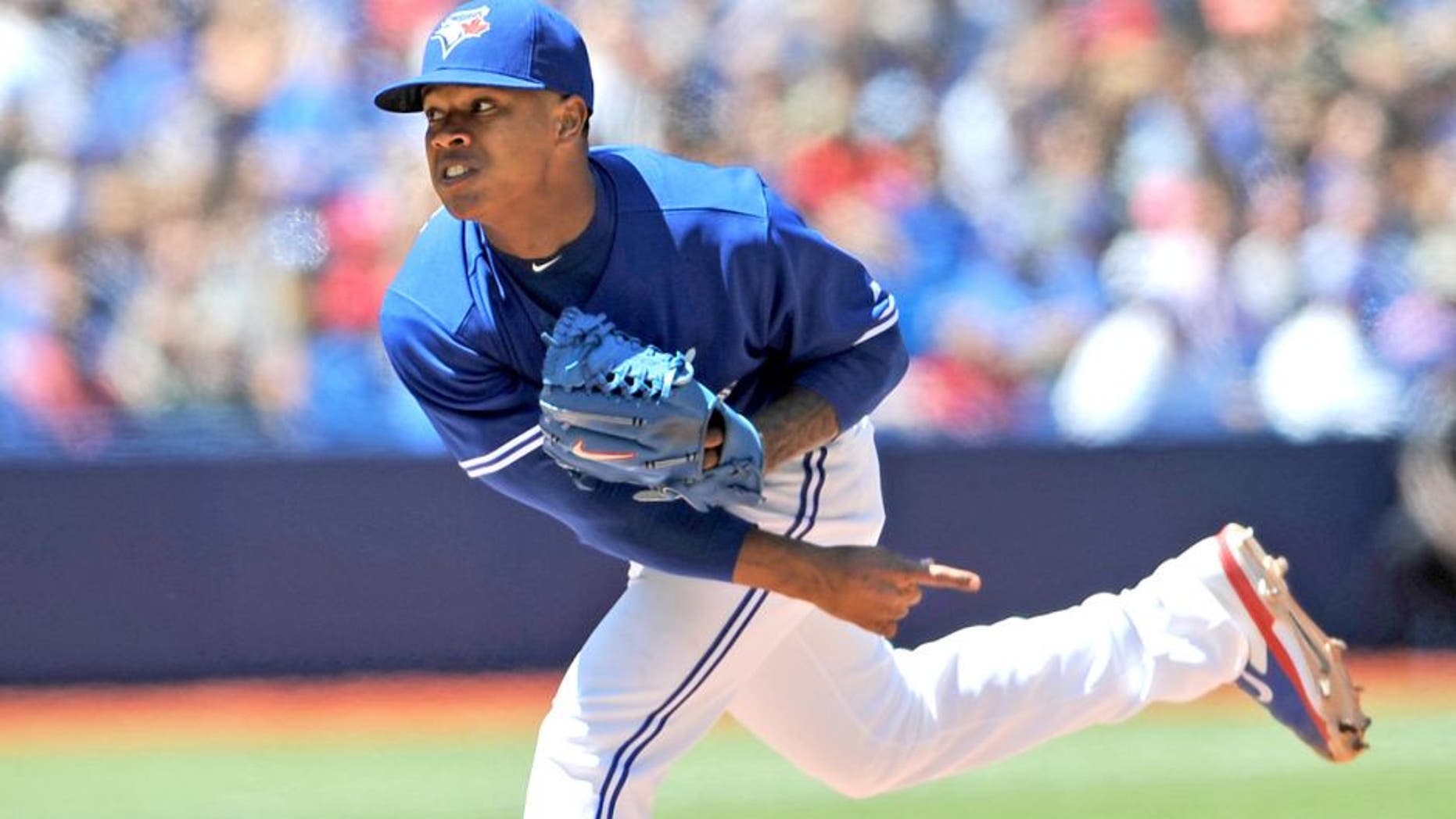 Jul 24, 2014; Toronto, Ontario, CAN; Toronto Blue Jays starting pitcher Marcus Stroman delivers a pitch during the Jays 8-0 win over Boston Red Sox at Rogers Centre. Mandatory Credit: Dan Hamilton-USA TODAY Sports